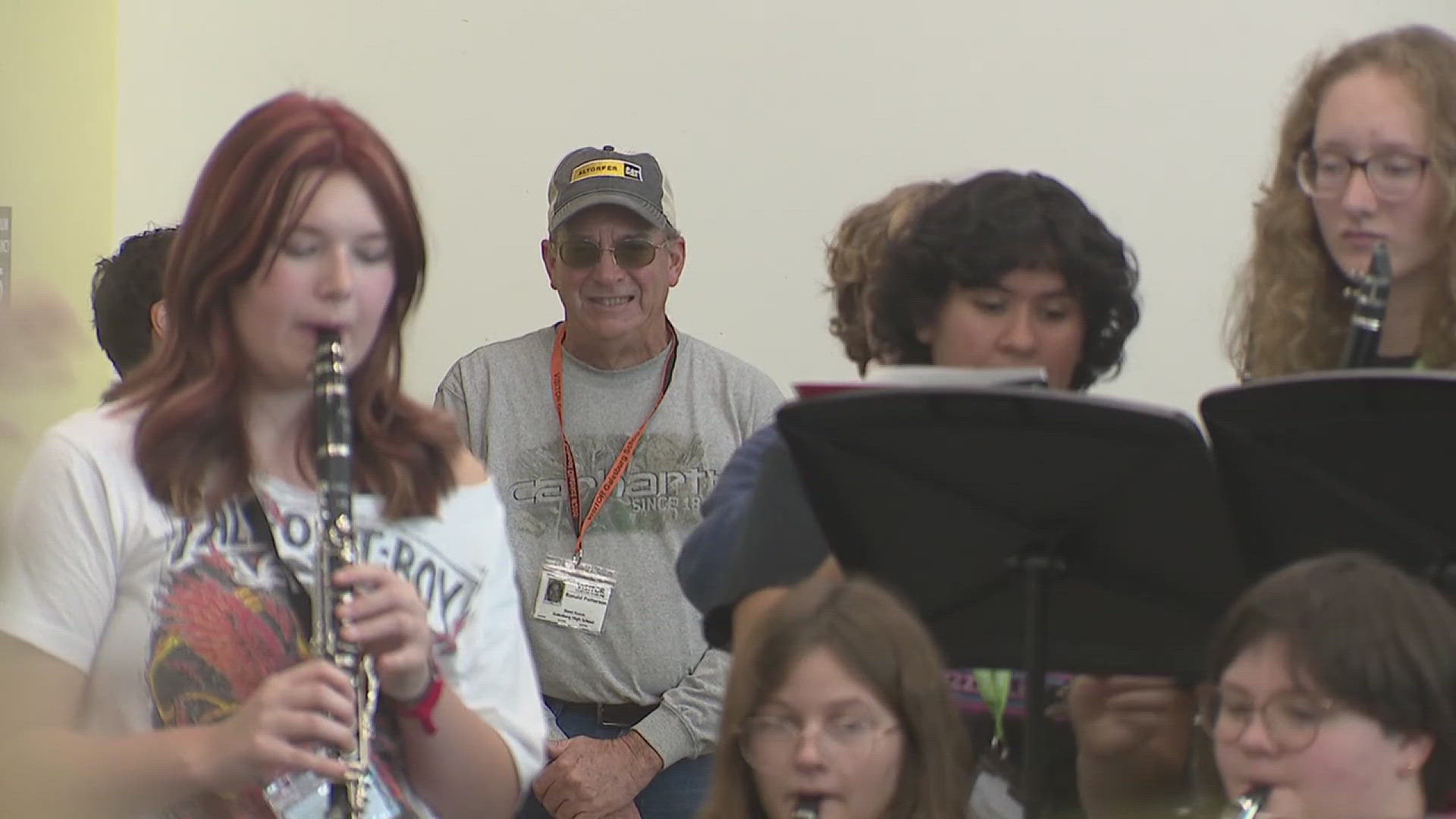 Tim Patterson never played in the school band, yet he's dedicated nearly a decade volunteering for the Galesburg High School marching band, supporting the fine arts.