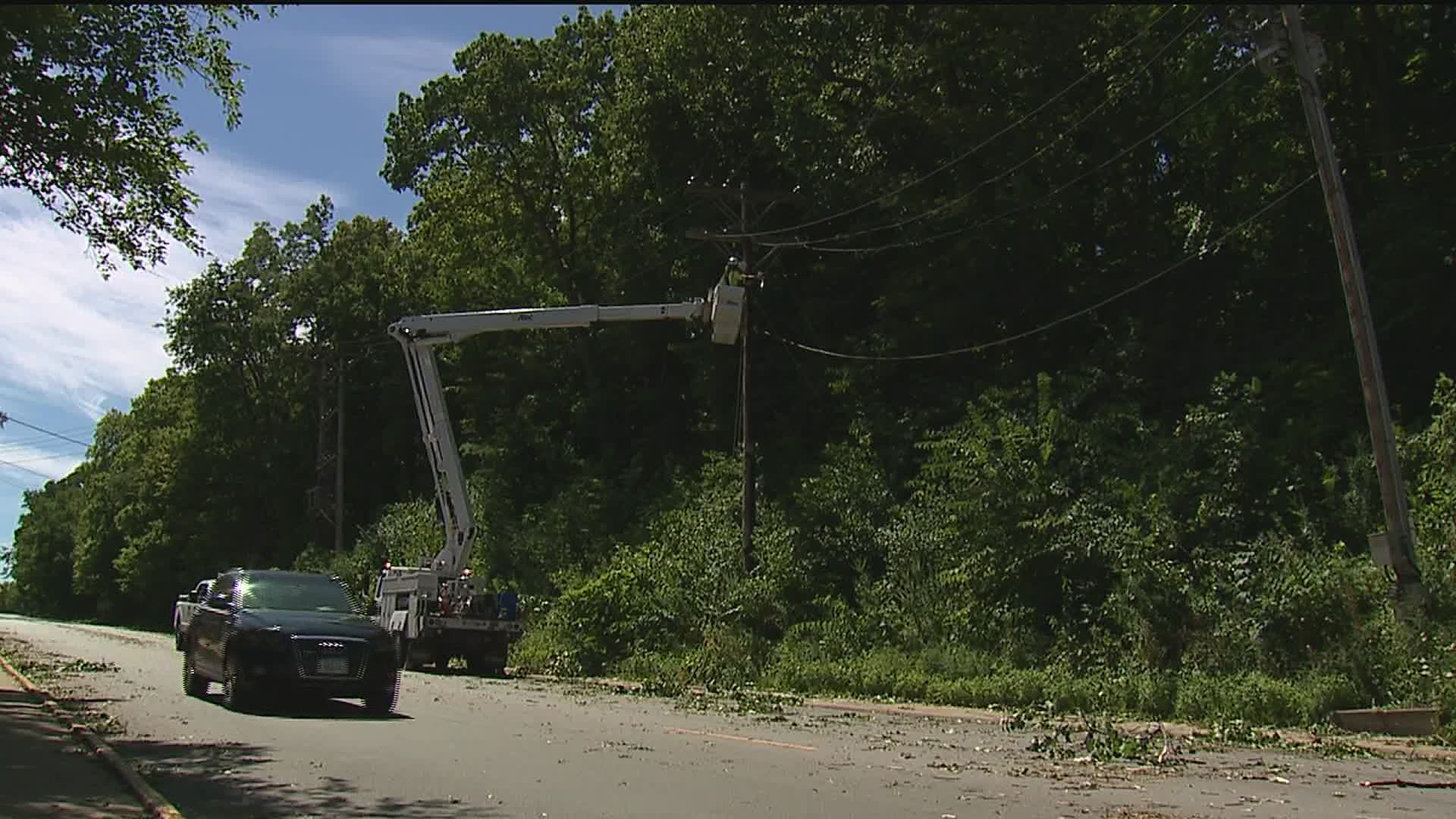 Tens of thousands still waiting for their power to be reconnected after uprooted trees and crashing limbs sever power lines across the area