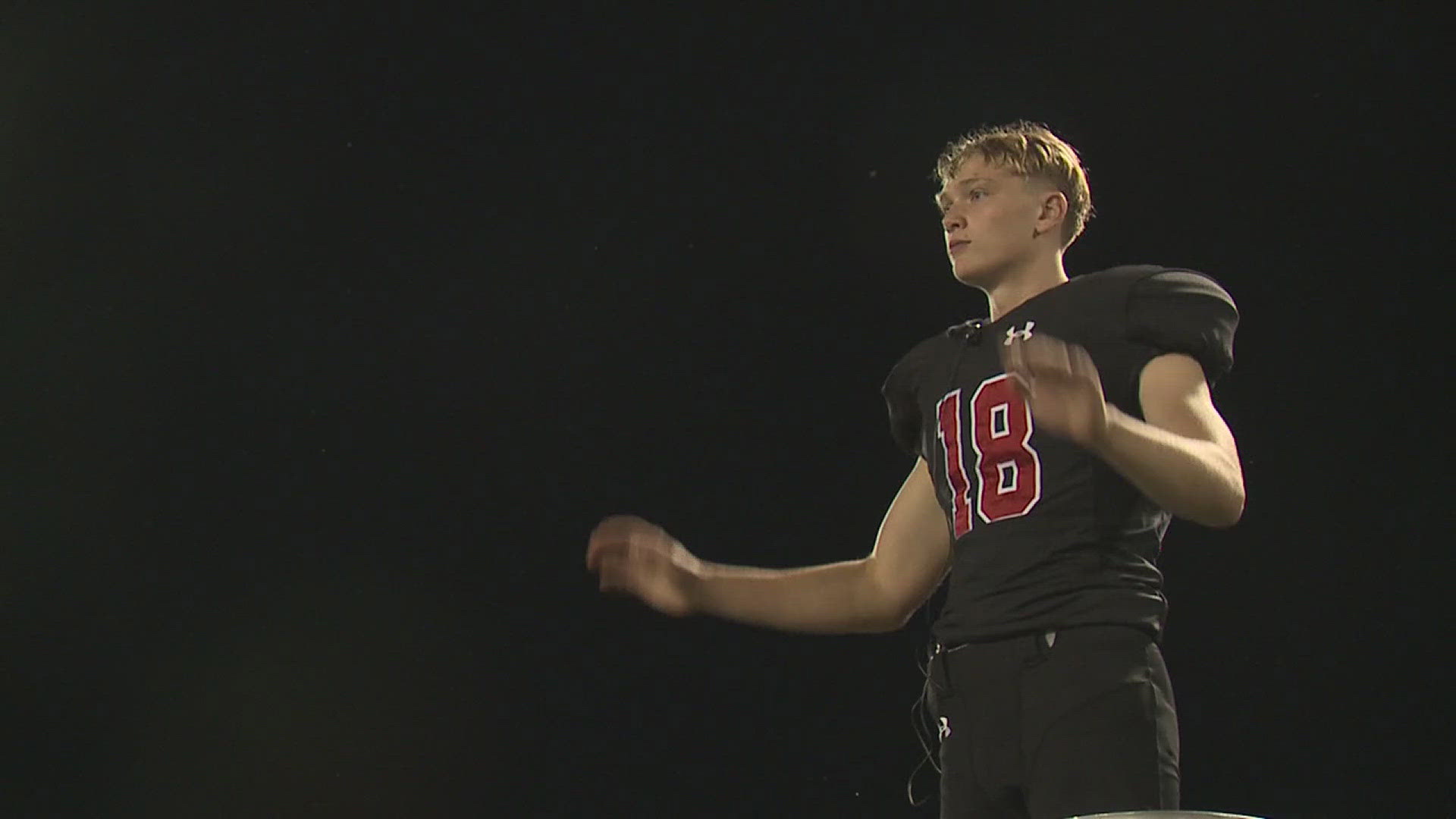 Chase Jasper is not only a part of the school's football team, he is also a drum major and spends his halftimes directing the marching band's performance.