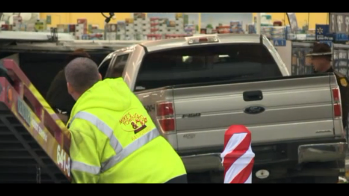 Three killed after pickup crashes through front door of Walmart in