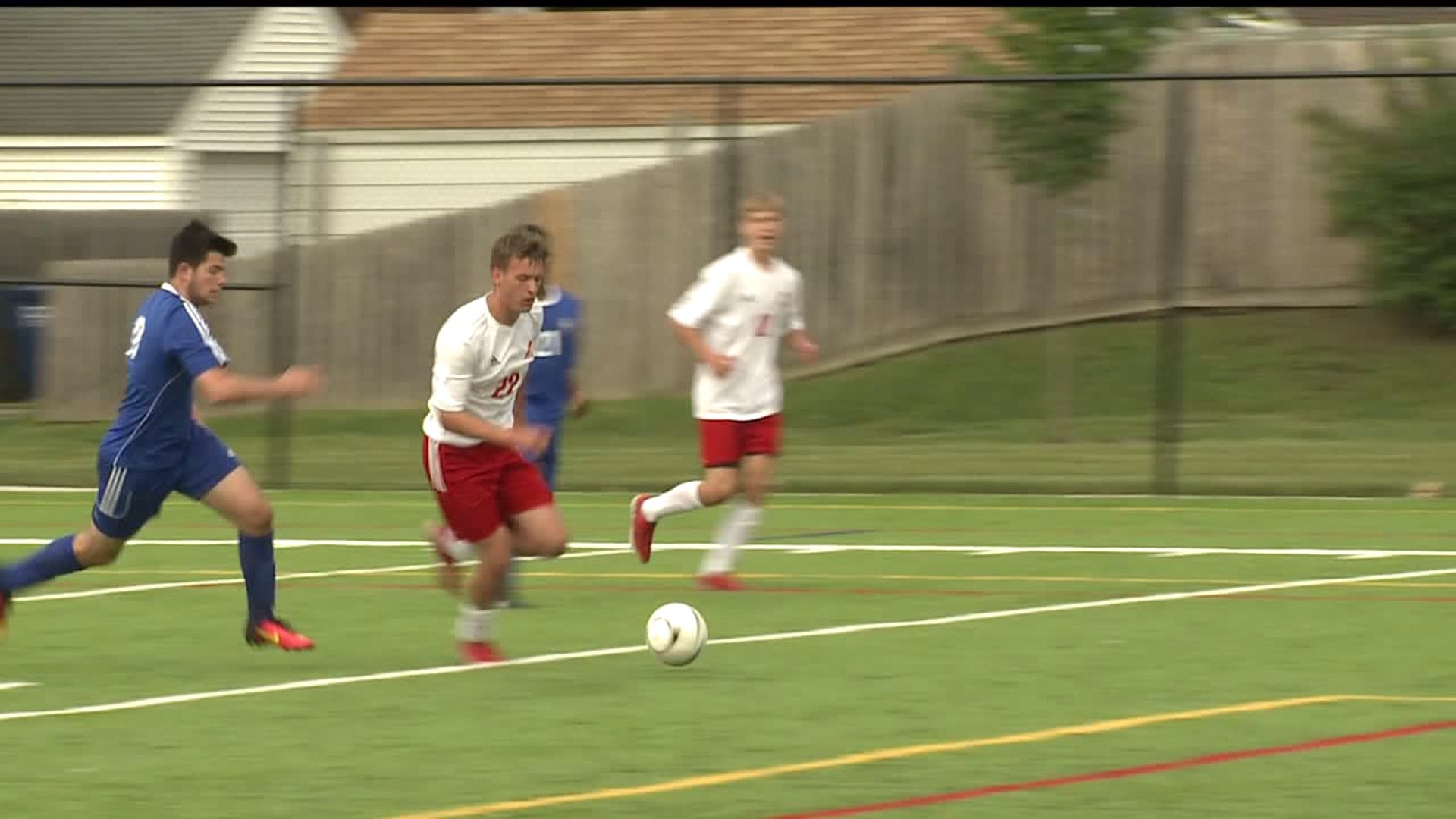 Assumption soccer cruises to win
