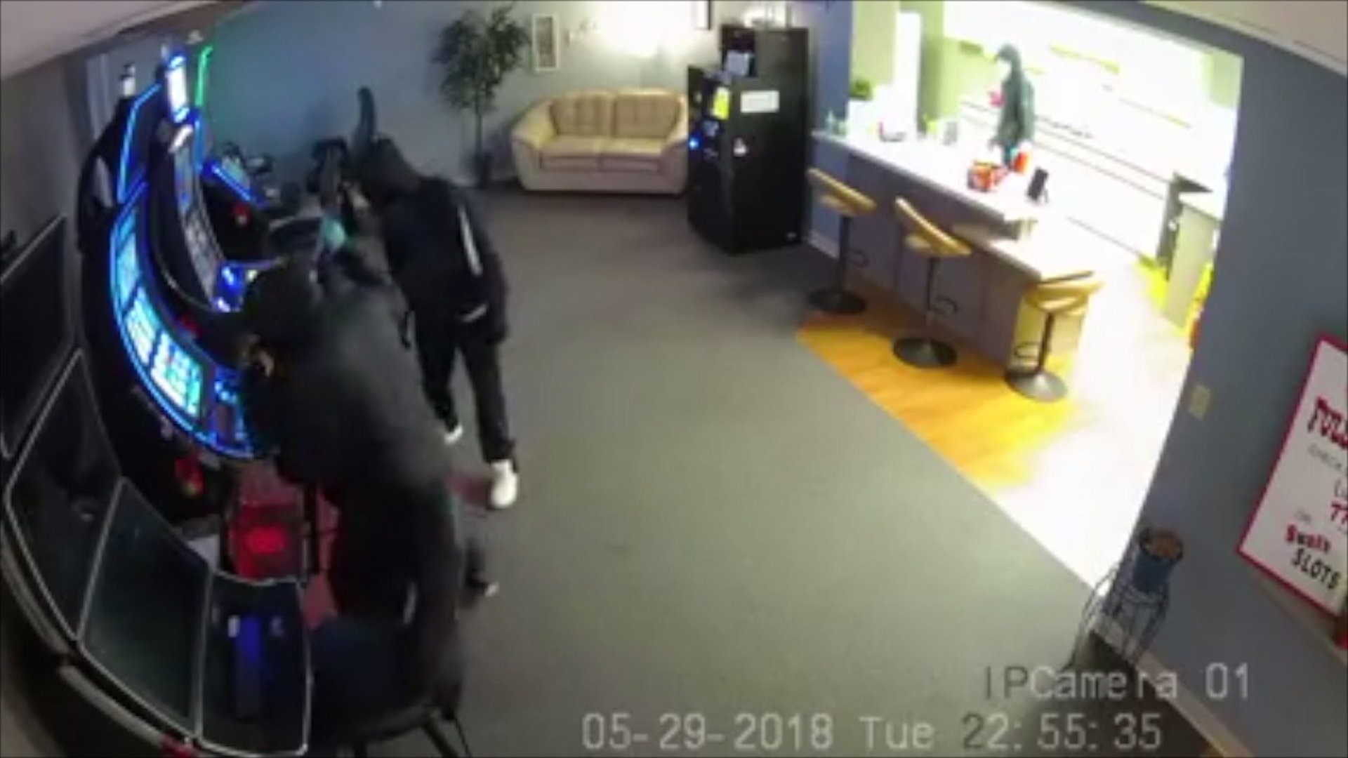 Armed robbery at video gambling parlor caught on video
