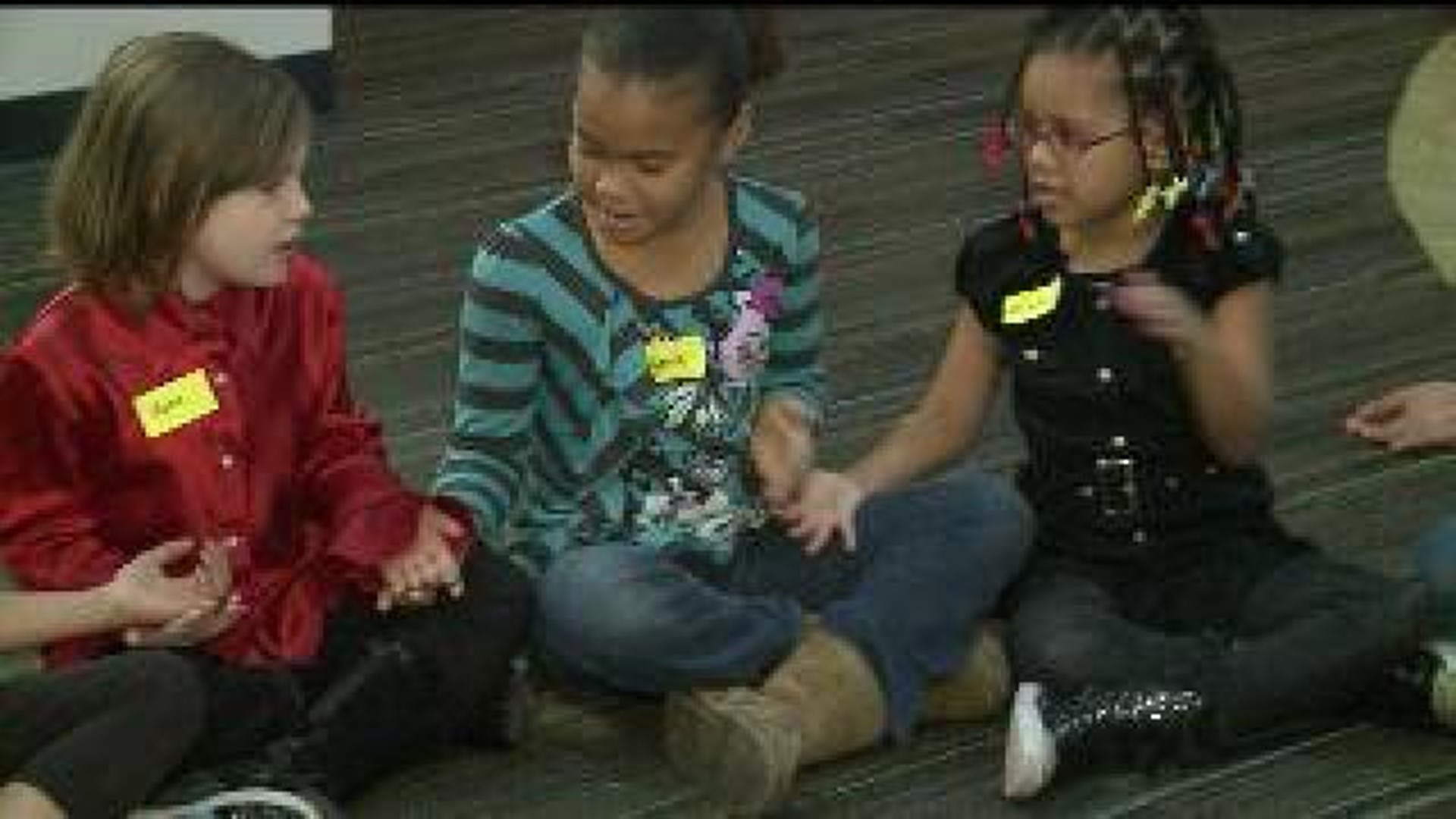 QC youth get \'Girl Scout experience\' at holiday party