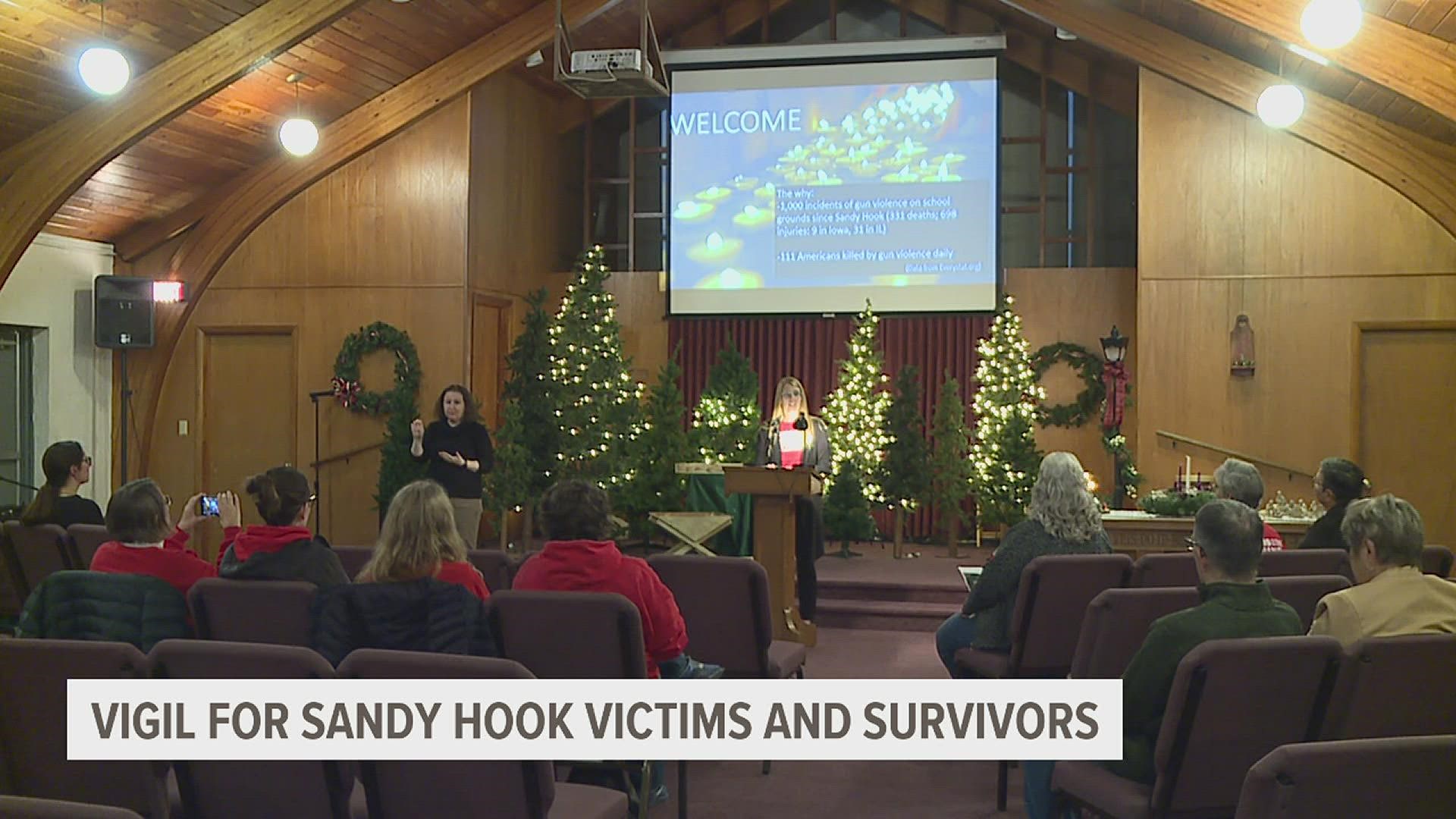 The event, hosted at Community of Christ Church in Davenport, named and honored the 26 people shot and killed at Sandy Hook Elementary School on Dec. 14, 2012.