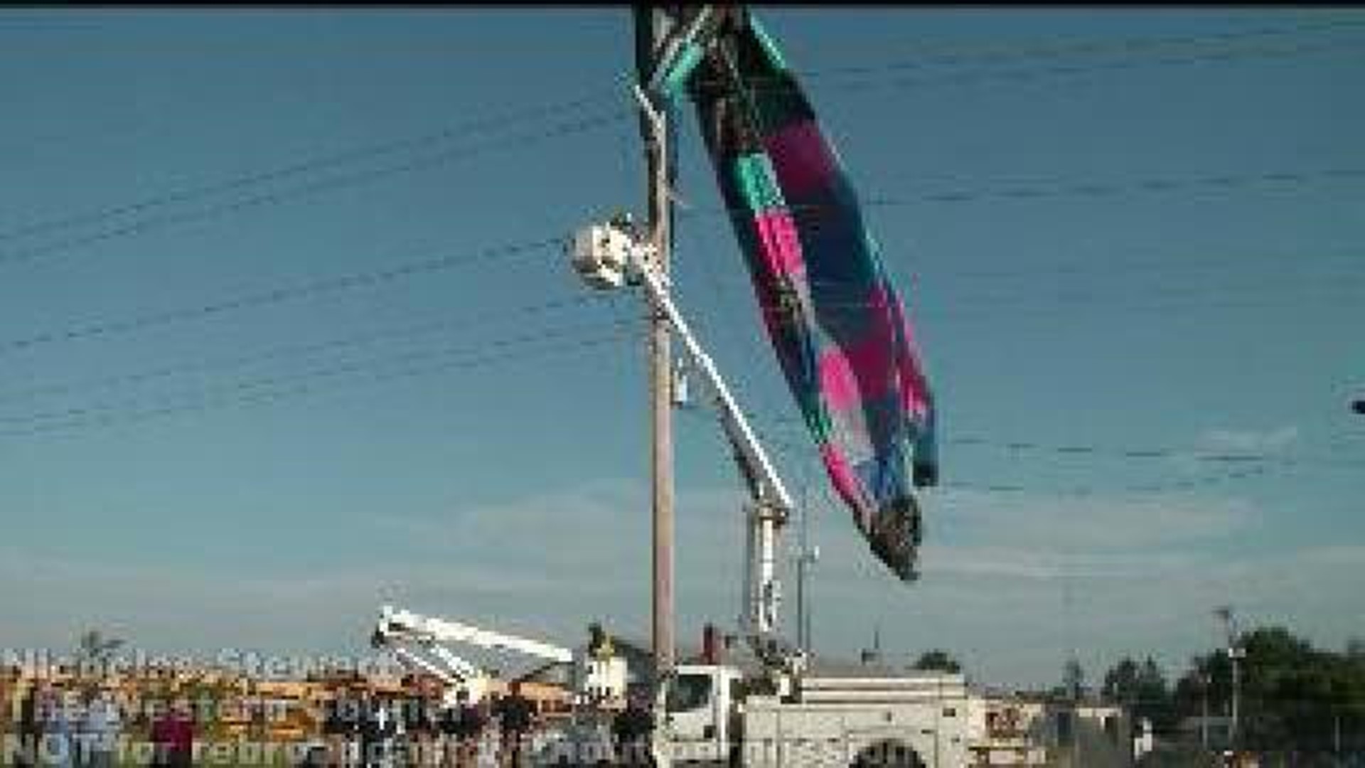 Hot air balloon collides with power lines