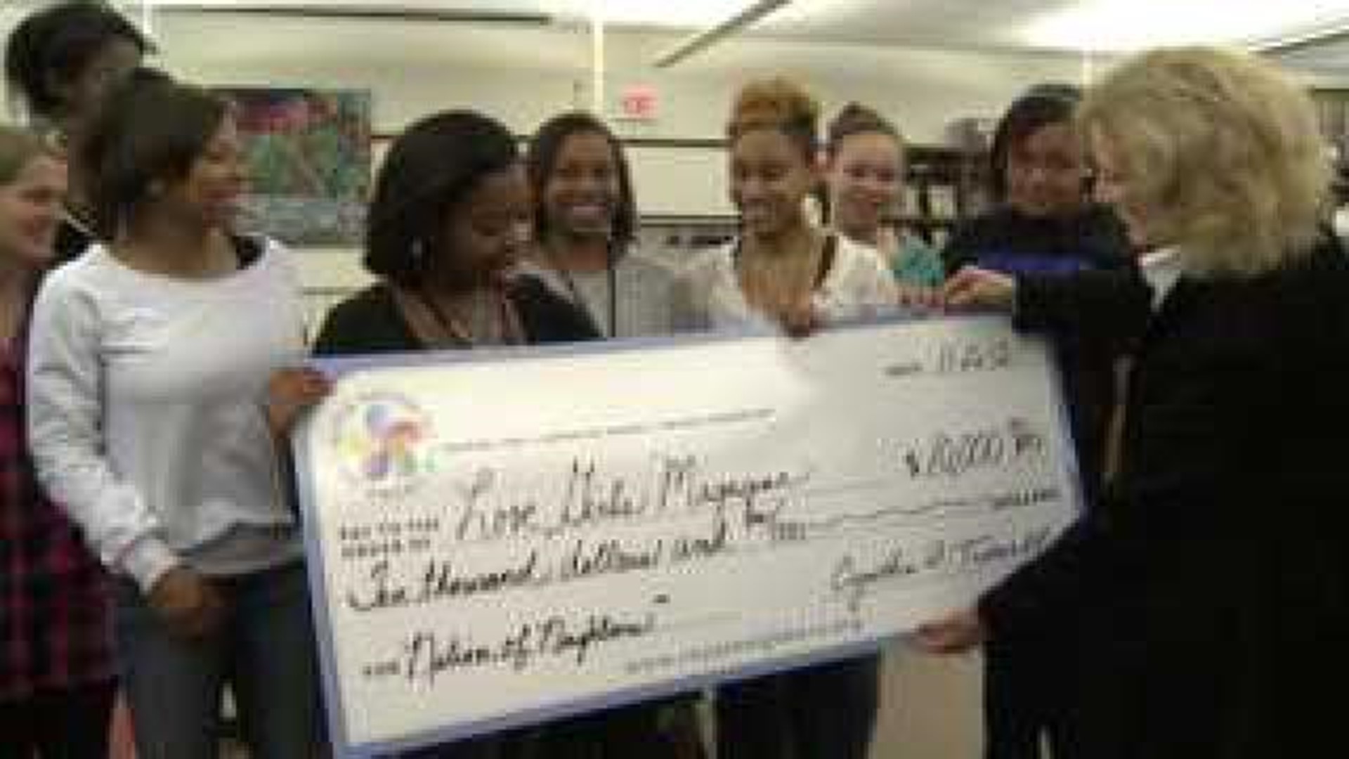 Rock Island girl suprised with $10,000