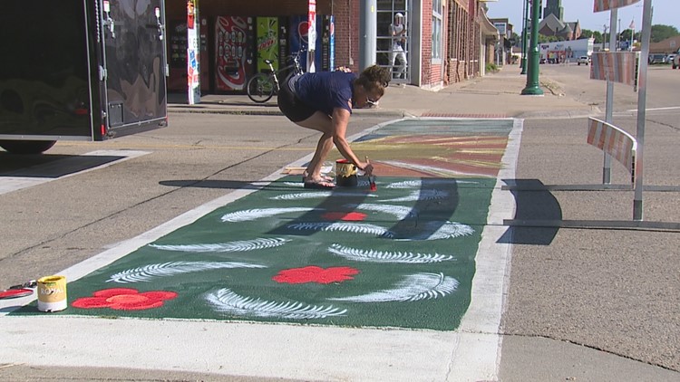 New murals are popping up in Clinton... on its crosswalks