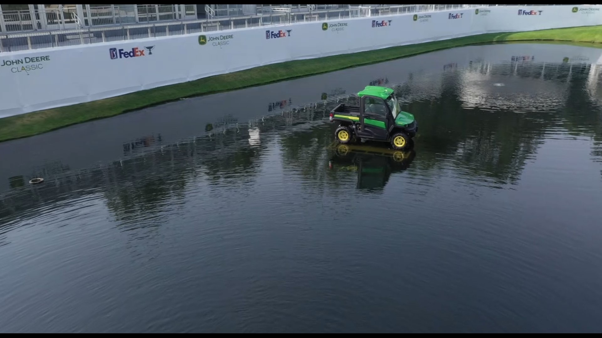 New at this year's John Deere Classic, a gator floats atop the pond on the 18th Hole. Turns out, it's all thanks to a few hardworking local students.