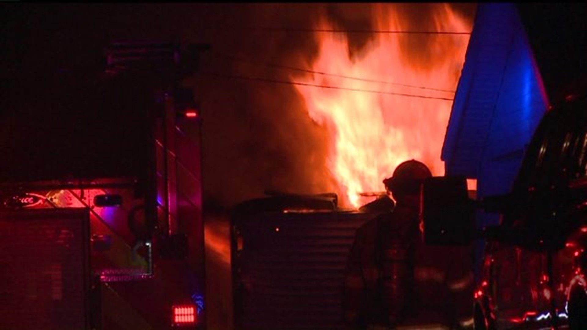 Two garages and utility pole catch fire in Moline