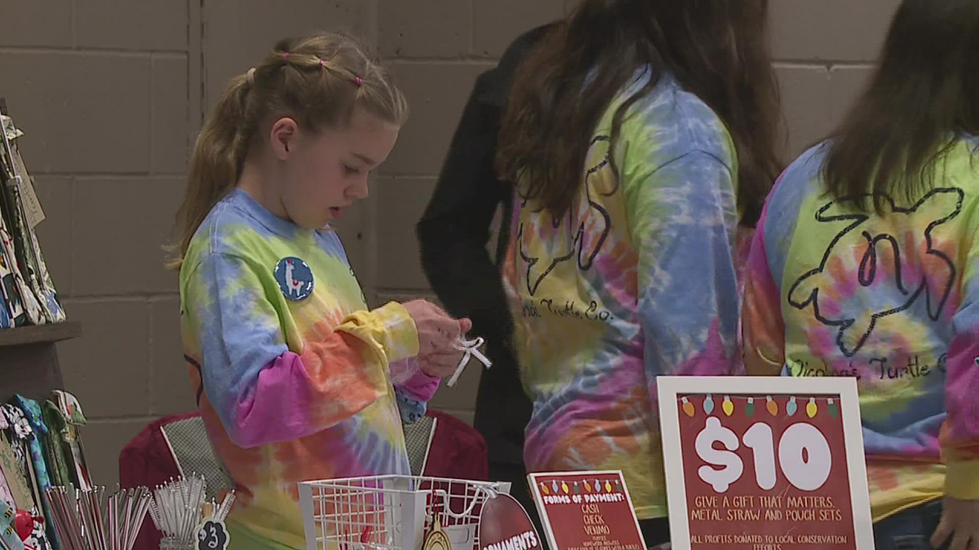 The fourth annual shopping event featured around 100 vendors, including 16 kid booths with their own handmade crafts.