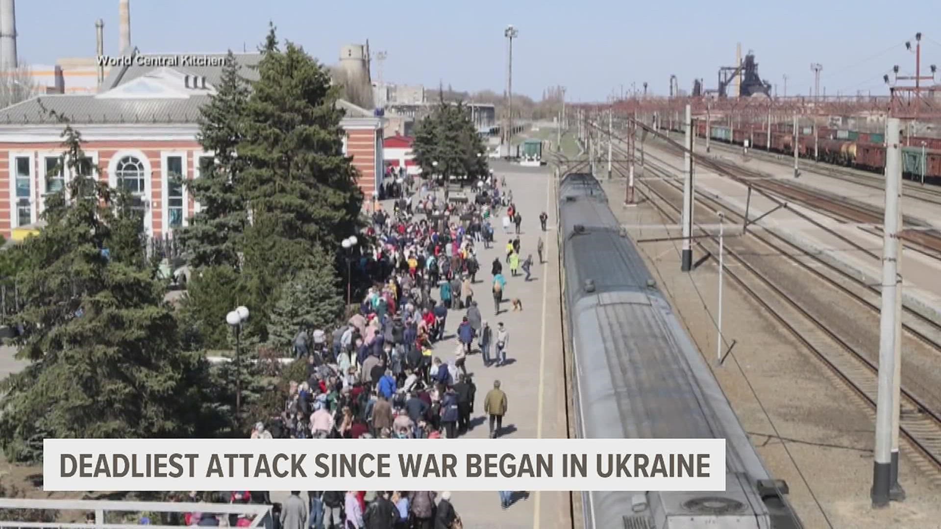 Civilian evacuations are moving forward in patches of battle-scarred eastern Ukraine a day after a missile strike killed at least 52 people at a train station.