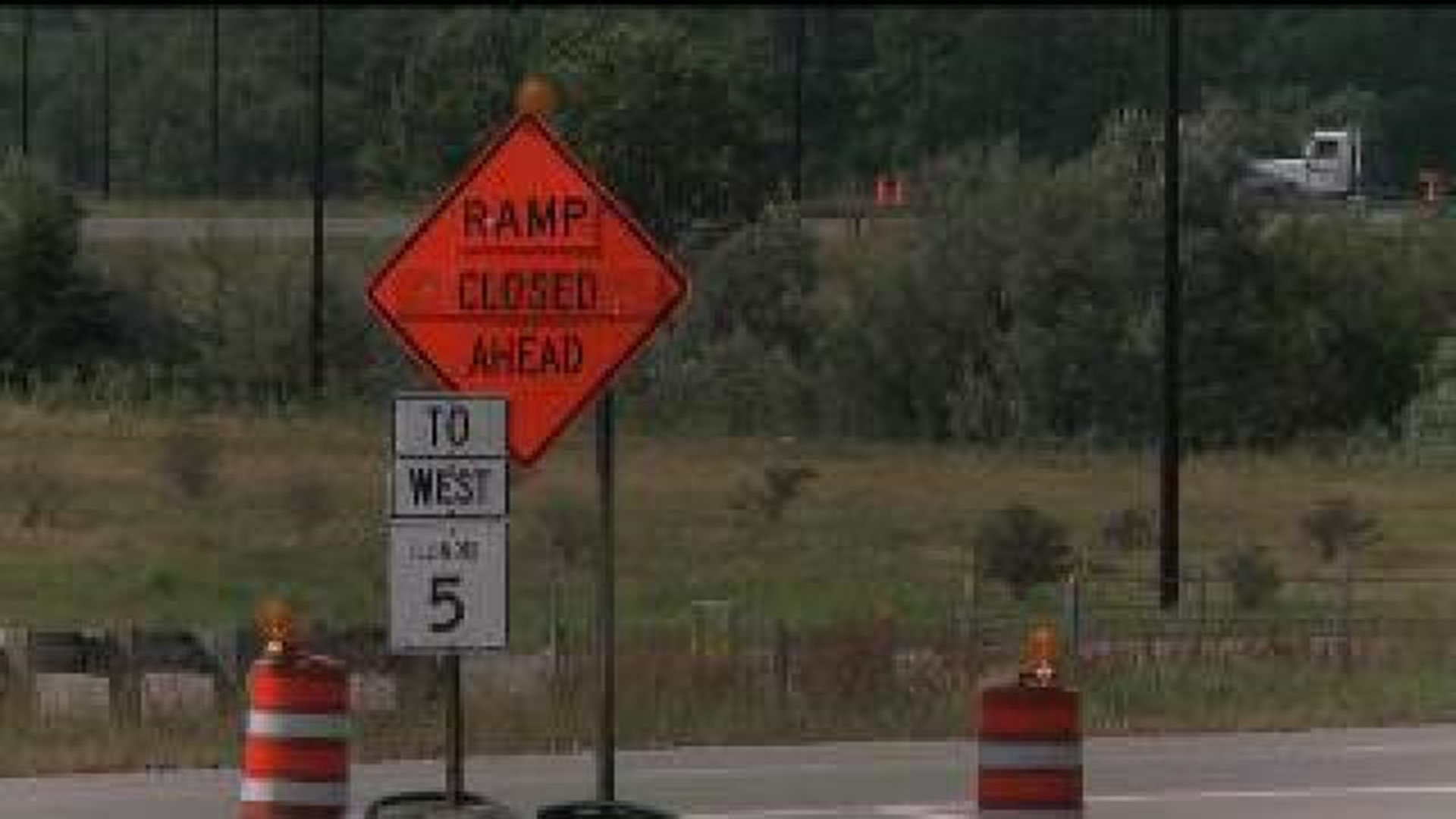 Road work blocks lanes and ramps at I-74 & John Deere Road