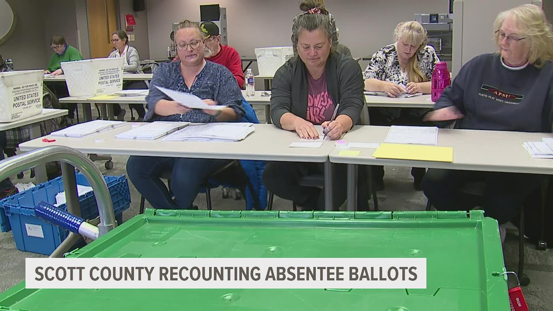 After experiencing issues earlier this week, Scott County election officials are recounting ballots by hand.