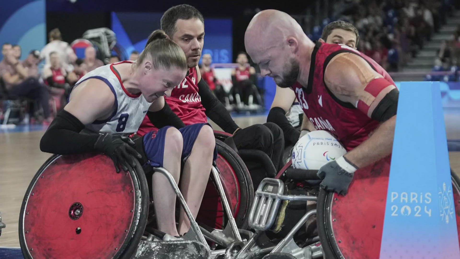 Sarah Adam is the first female to play for the US wheelchair rugby team and helped the US win in their first match against Canada.