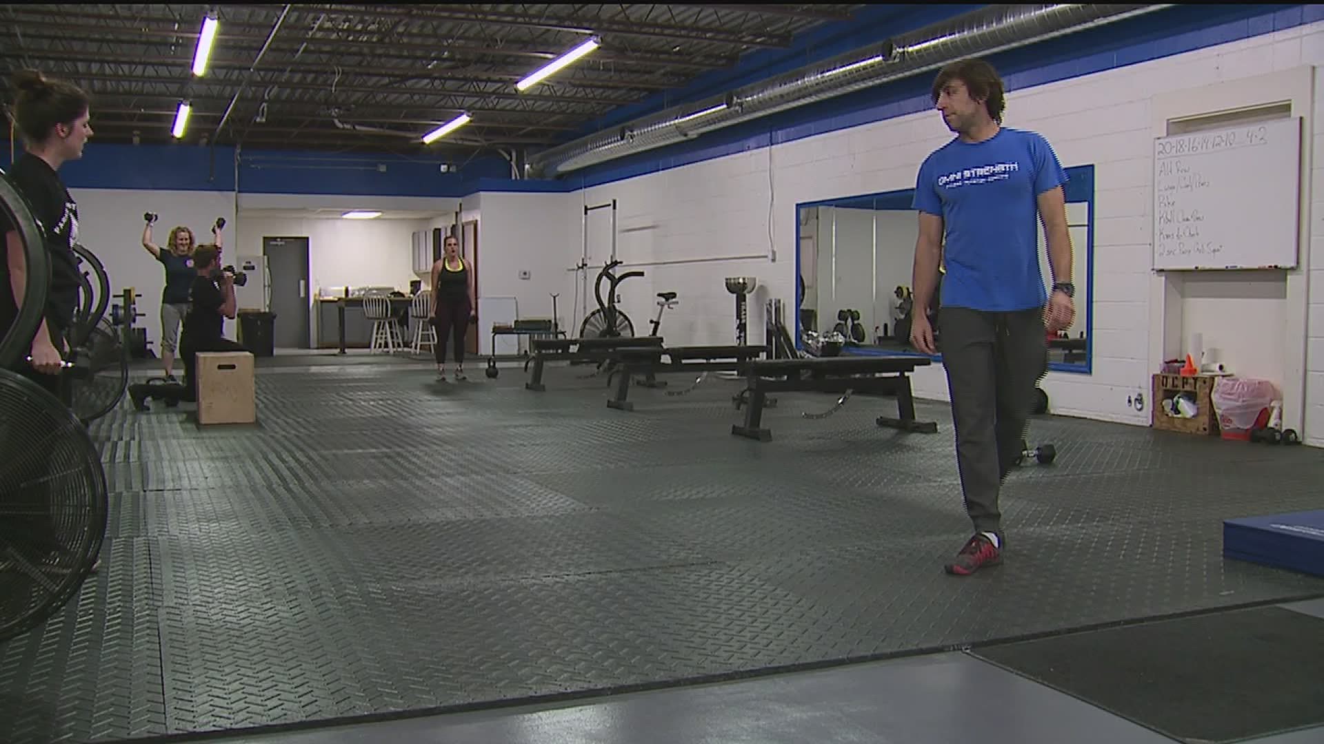 Omni Strength opened Tuesday for group training in hopes of a confrontation with authorities