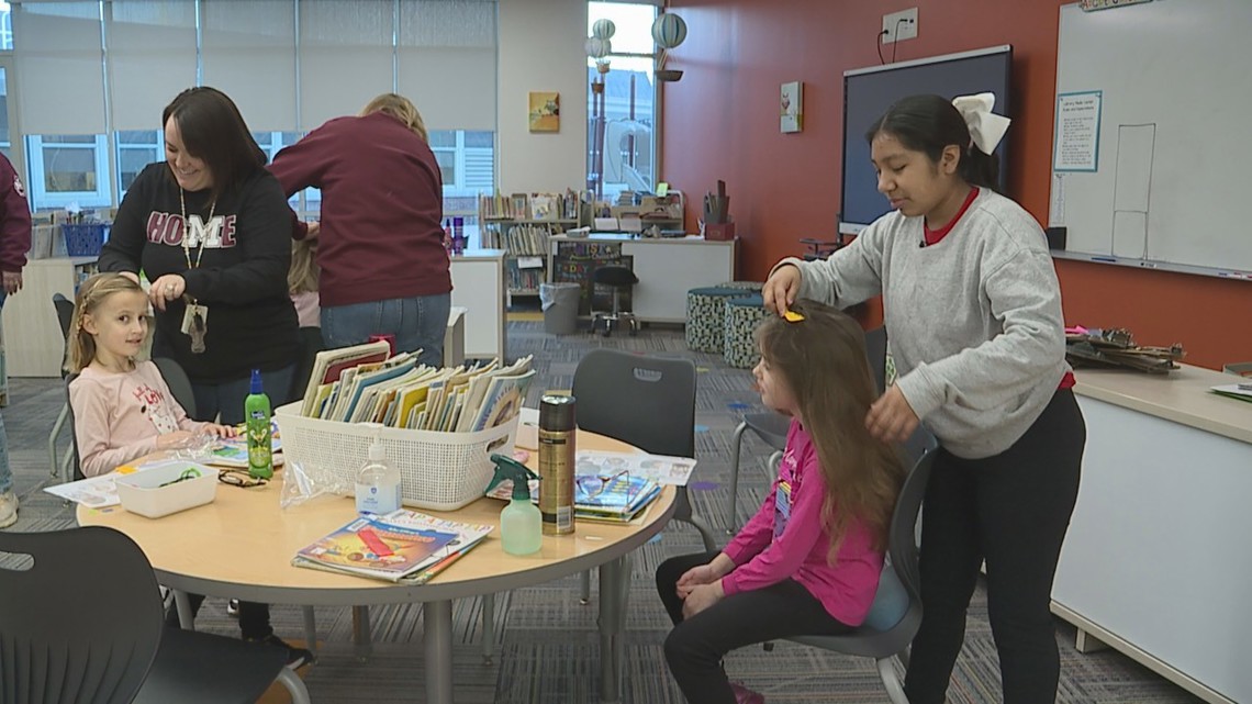 'Books and Braids' salon bringing together Moline teachers and students