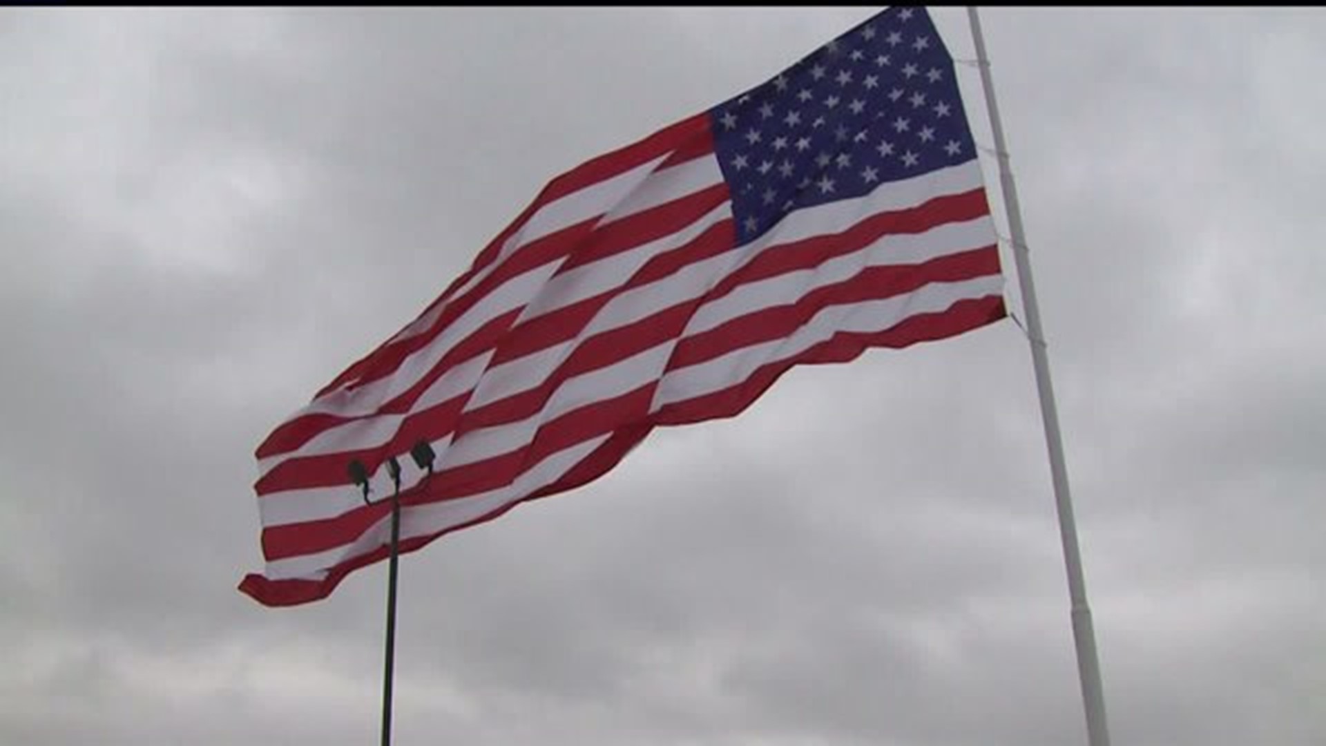 Giant flag raised for new business
