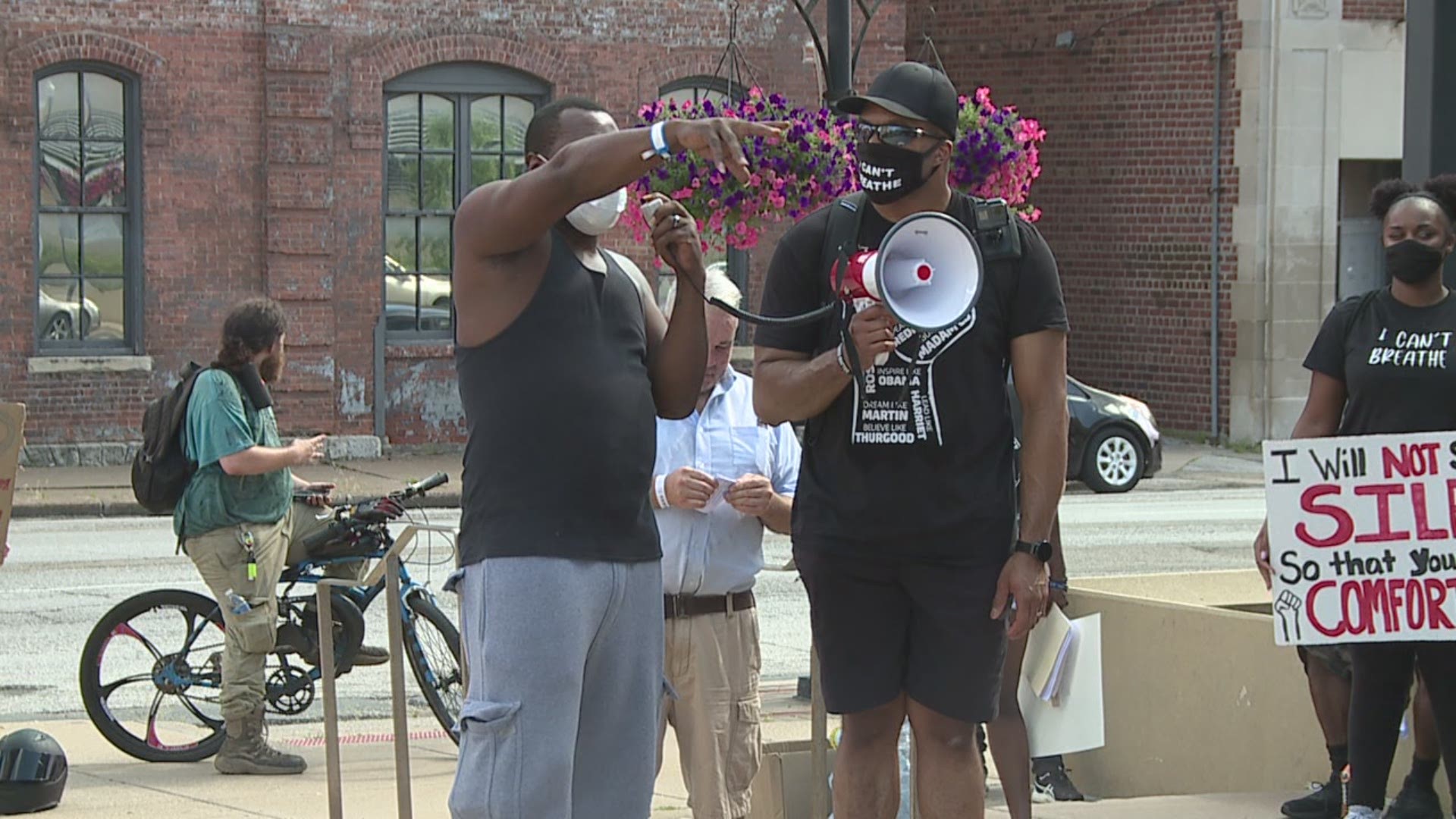 Dozens gathered outside the Davenport Police Department to protest against the use of excessive force.