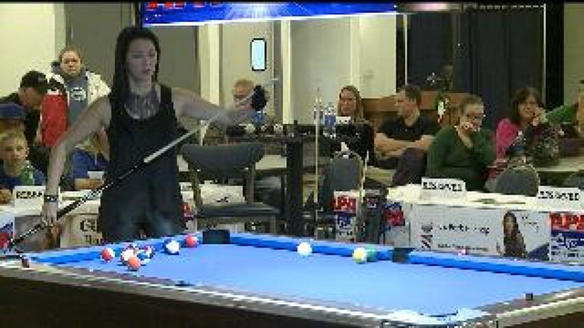 Black Widow brings pool tricks to Davenport