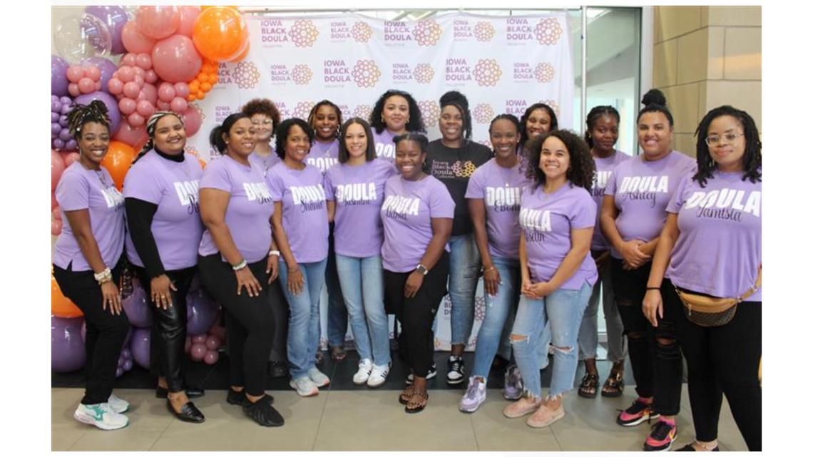 Iowa Black Doula Collective holding community baby shower