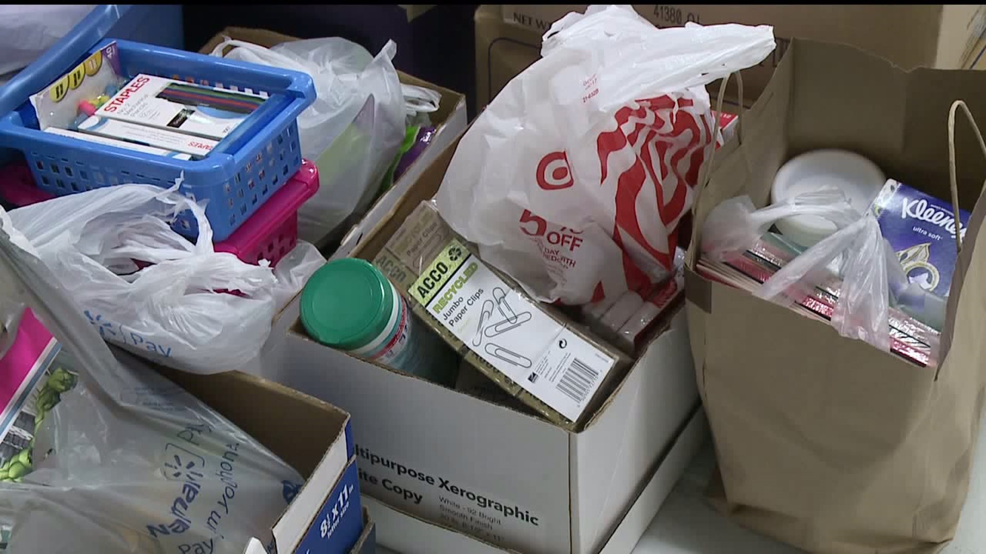 Moline High School students accept donations