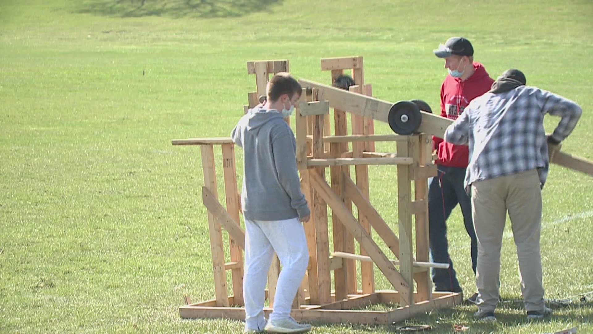 Engineering students launched raw eggs using trebuchets.