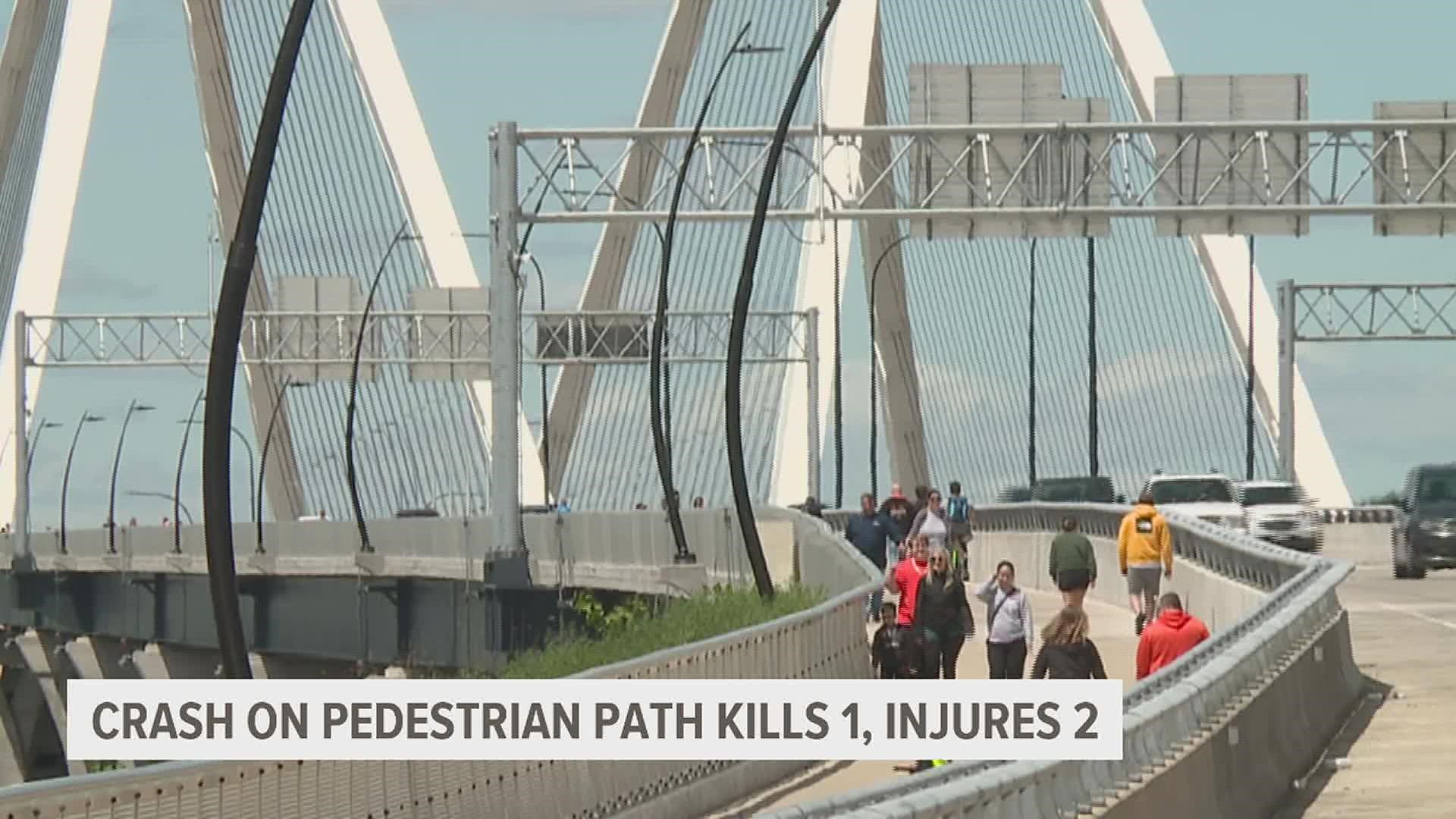 A person is in custody after driving onto the I-74 bridge pedestrian path and striking three people.