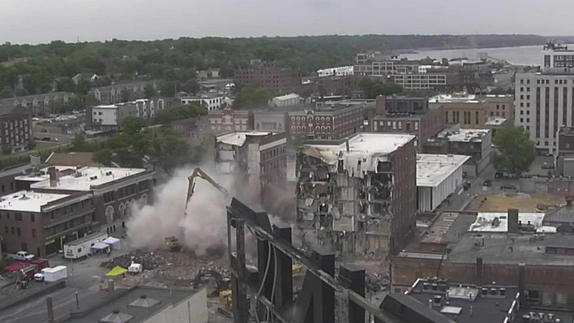 Demolition of 324 N. Main Street in Davenport has progressed quickly, with the northern portion of the apartment taken down by mid-morning of June 13.