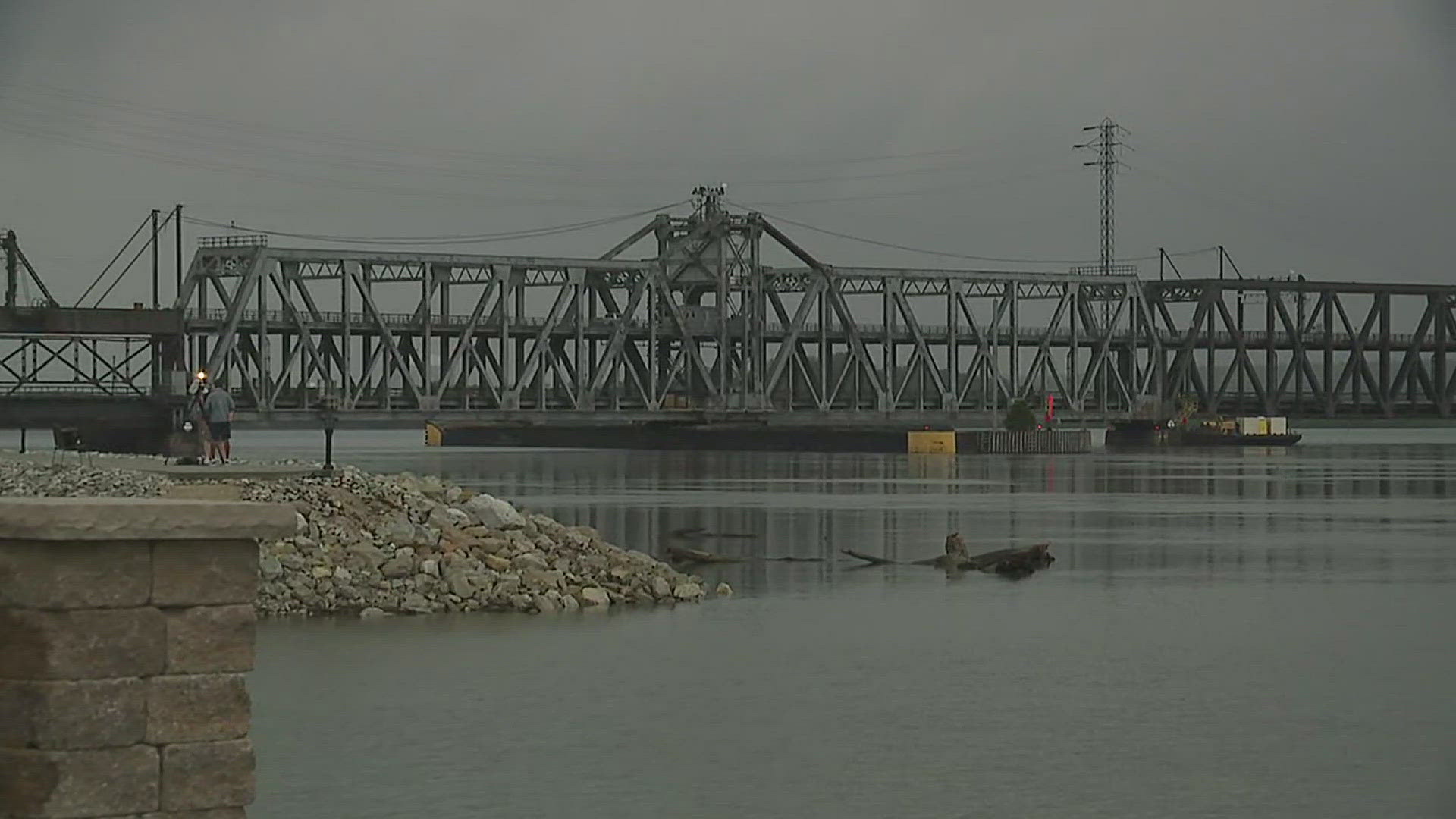 The Fort Madison Bridge has reopened after being struck by a barge Thursday afternoon. The barge was resting partially submerged in the Mississippi River afterward.