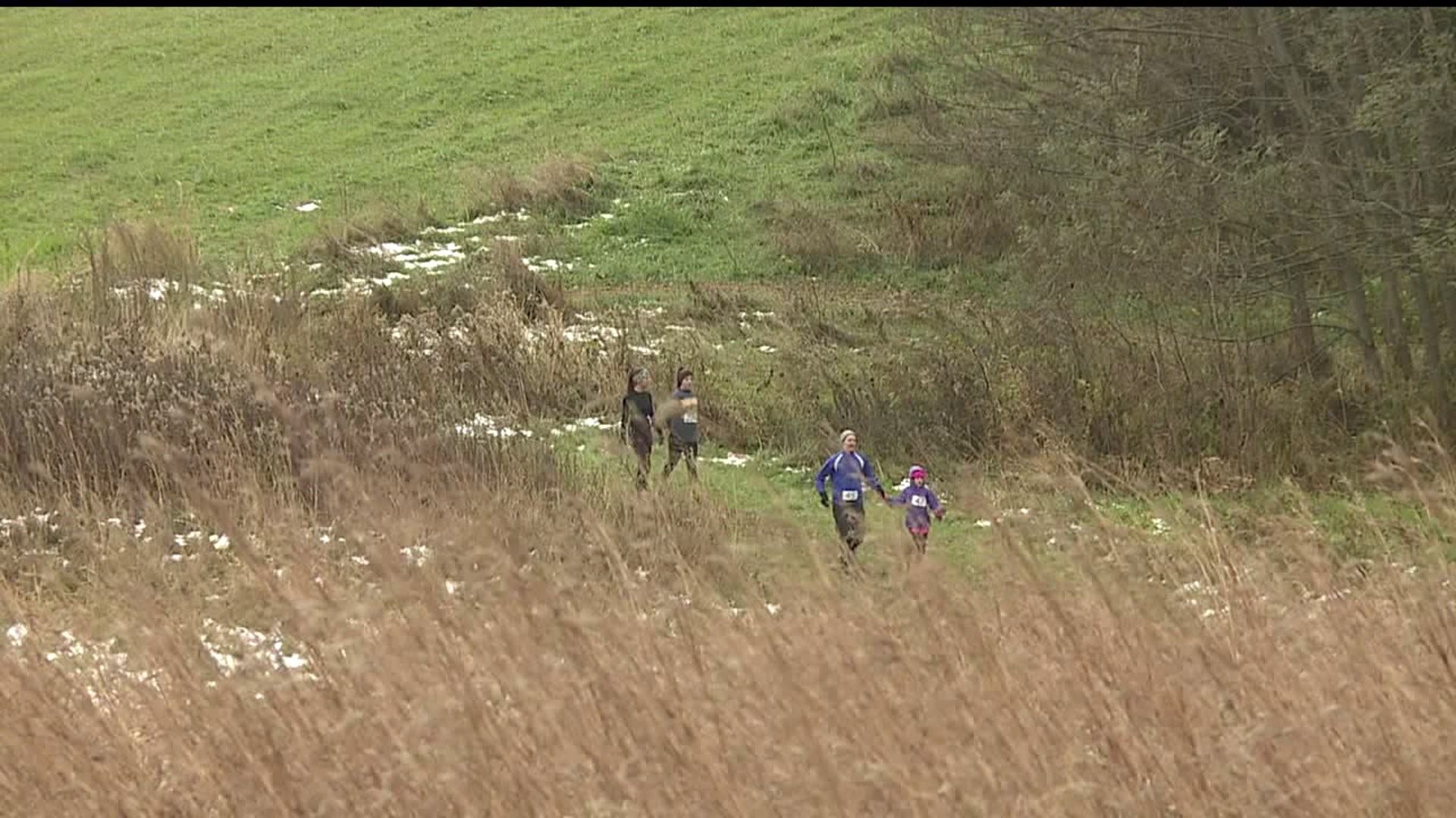 Runners power through messy tracks for Governor`s European Cross Country Run