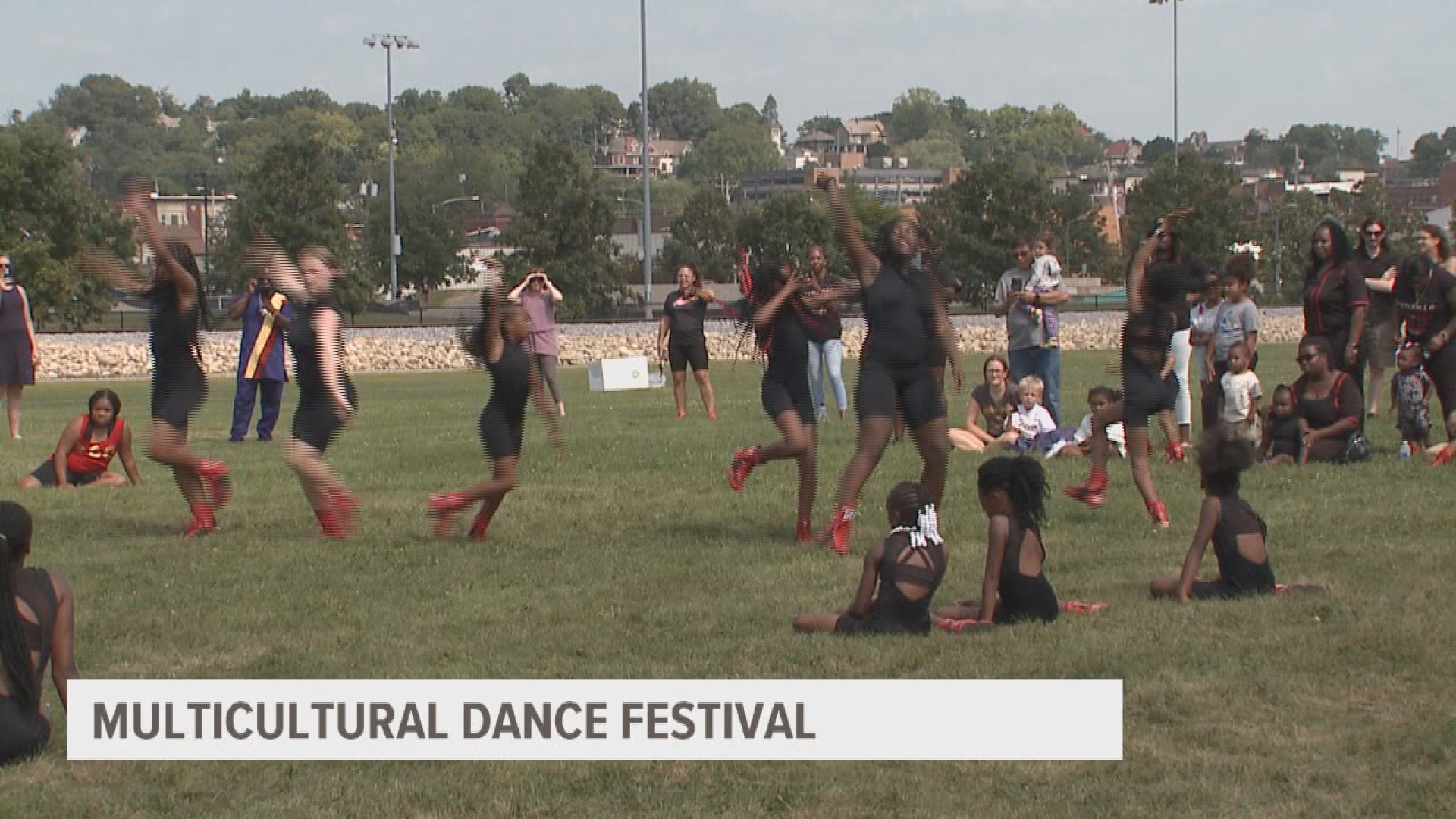 People of all ages hit the dance floor to celebrate diversity at Centennial Park in Davenport.