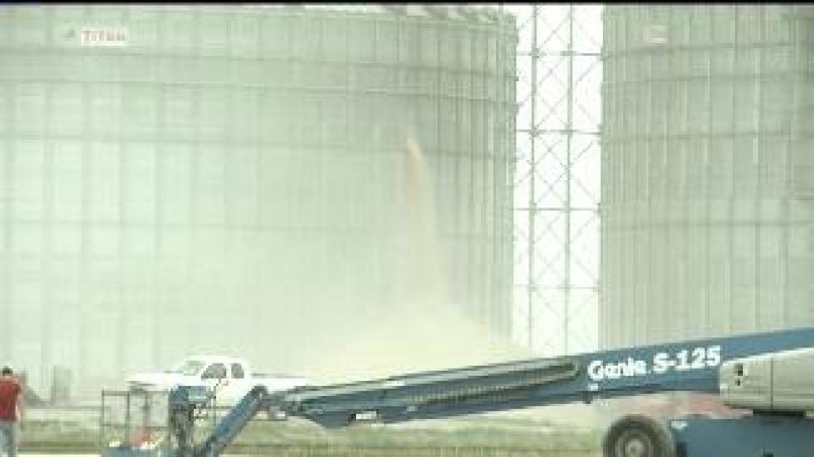 Crews fight grain bin fire for two days near