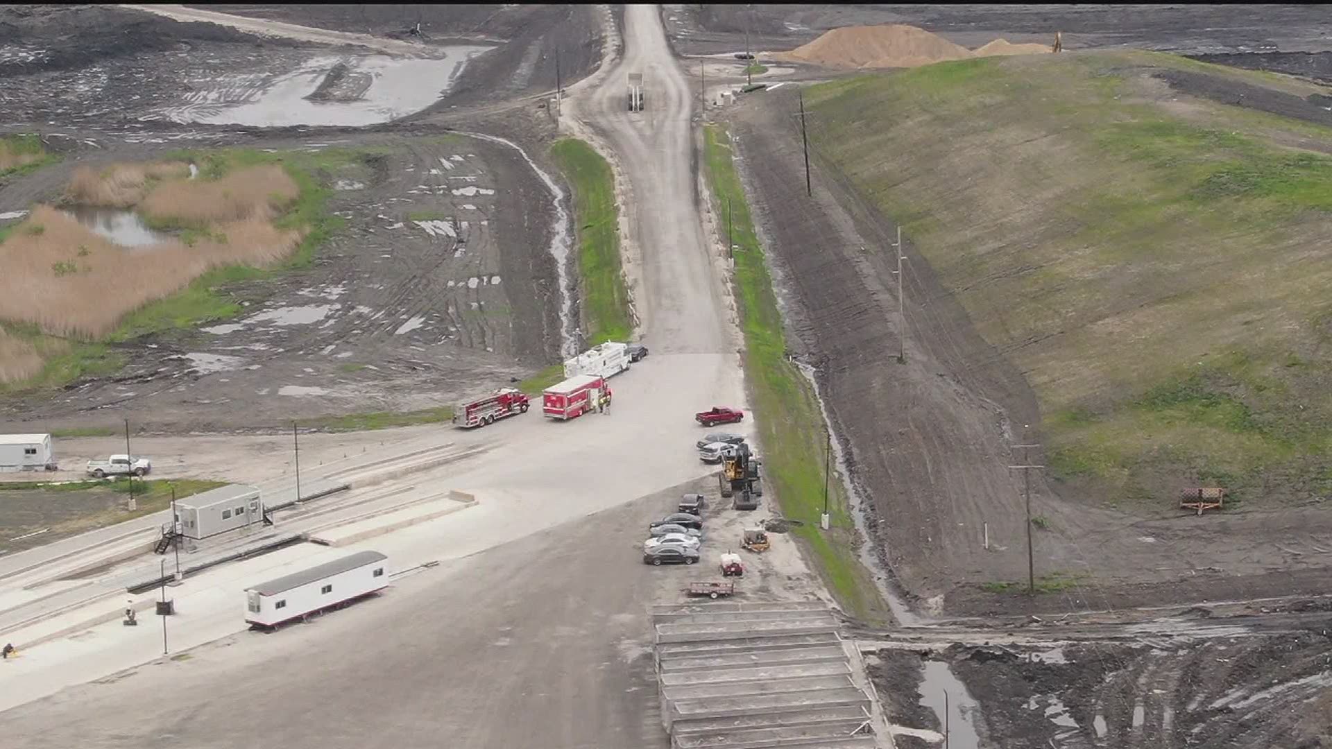 Police say the body of a man found in a landfill was not from the Quad Cities area.