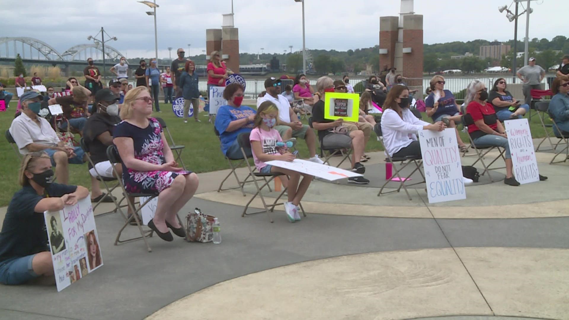 Hundreds of women rallied in Rock Island Saturday afternoon to protest strict abortion laws passed in Texas.