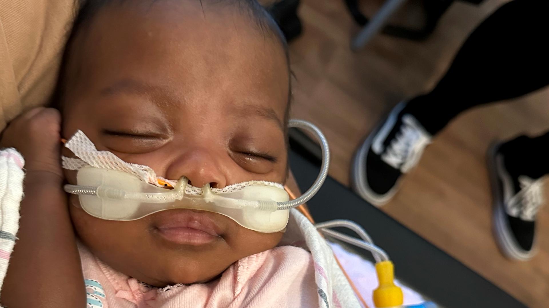 A baby who weighed just over one pound when she was born prematurely in November has beaten the odds and gone home with her parents after six months in the hospital.