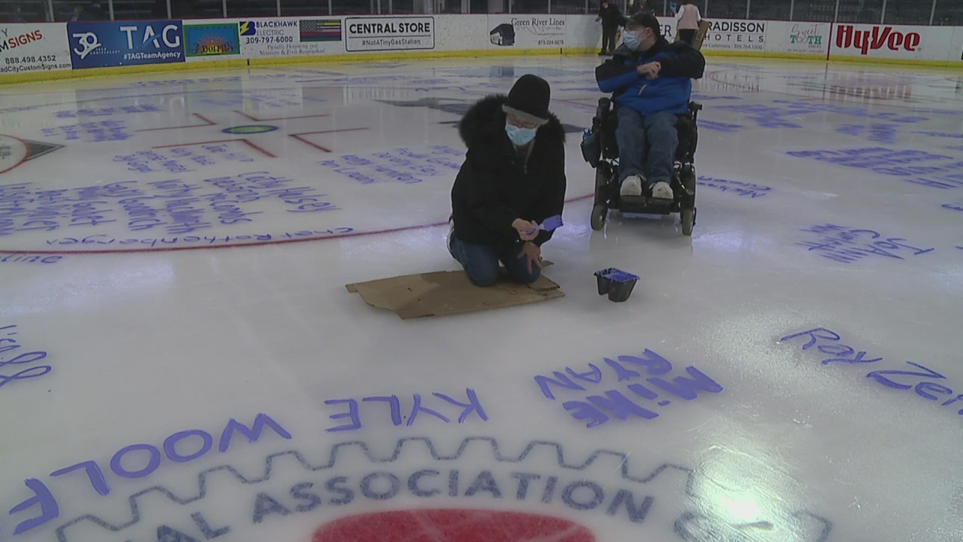 Ahead of "Hockey Fights Cancer" night, the QC Storm and UnityPoint Health Trinity invited people to paint the ice with names of cancer survivors and fighters.