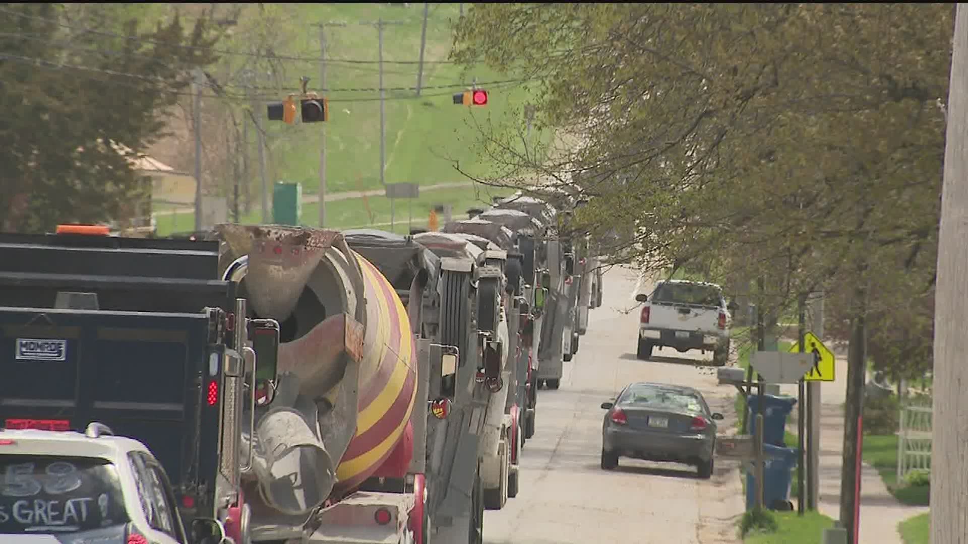 It might've been a strange sight to see this many mixer trucks all at once, but the company was celebrating an extremely dedicated worker.