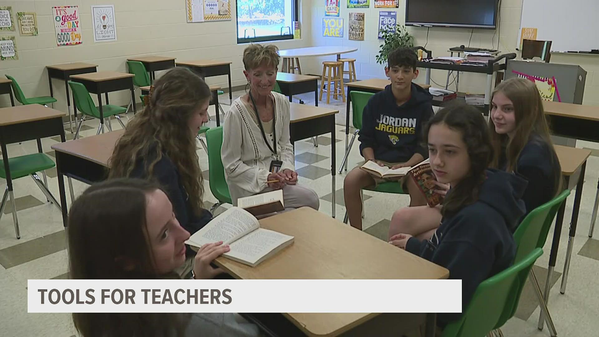 Seventh-grade teacher Debbie Marlier was awarded a $200 gift card that she plans to give back to her class with some end-of-year celebrations.