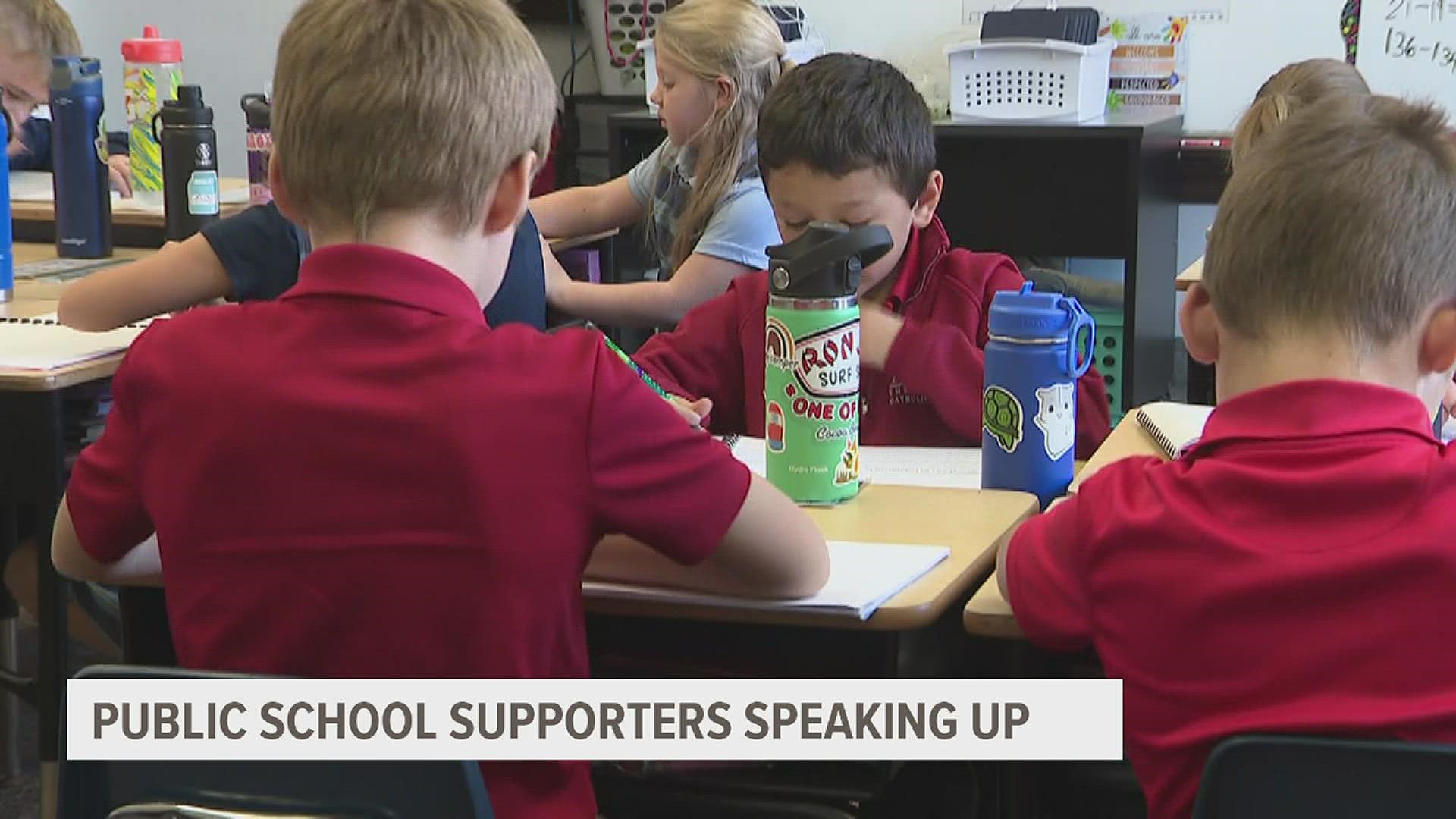 Gov. Kim Reynolds is continuing her push for private school vouchers in the state of Iowa, while voices in public education continue to condemn the idea.
