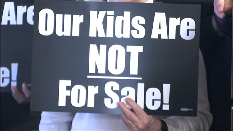 'Our kids are not for sale' | Union workers, parents rally in Davenport against proposed Iowa child labor laws