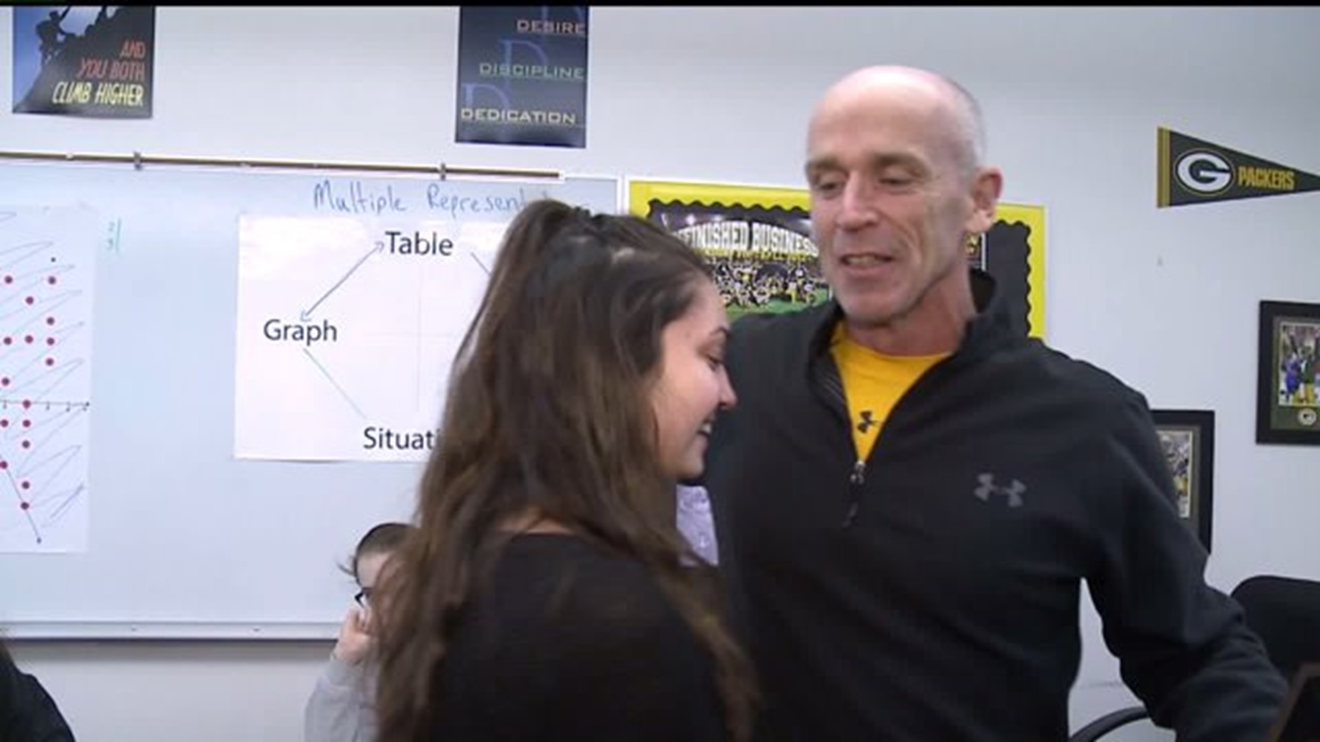 Teacher Helps Student Set Up March of Dimes Event