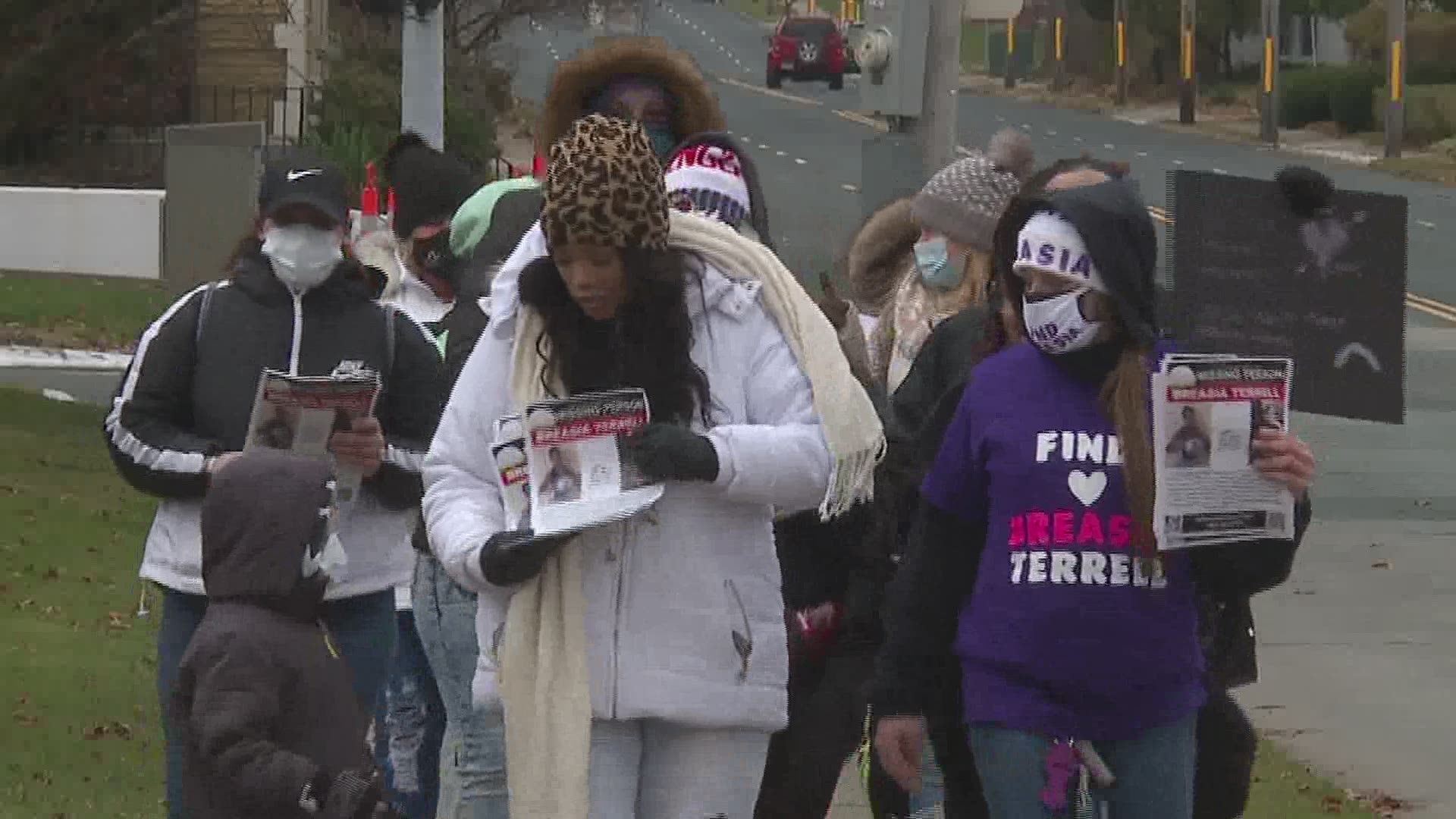 The two marches over the weekend included gathering on busy street corners throughout Davenport, holding signs and pictures and passing out fliers.