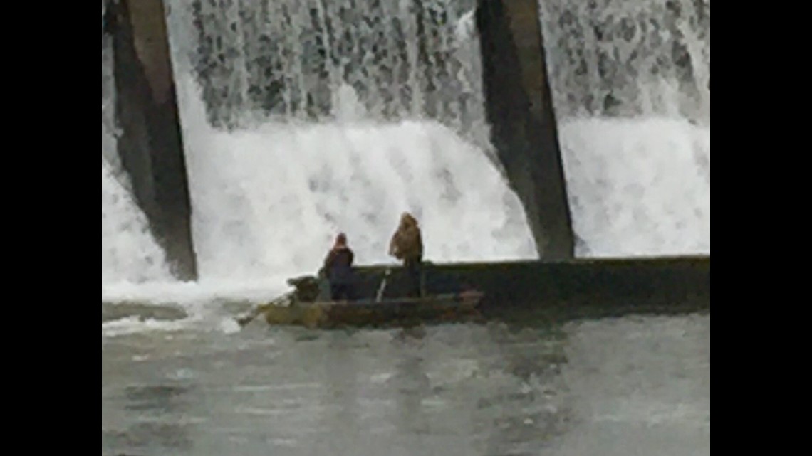 Dog stuck on Maquoketa River dam rescued