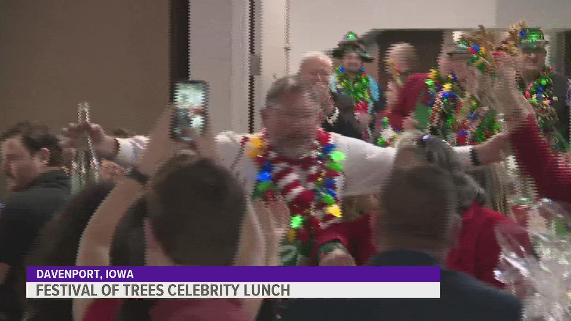 Local celebs and guests, like Bettendorf mayor Mike Gallagher, brought fun and energy as they waited tables at the lunch benefitting Quad City Arts.