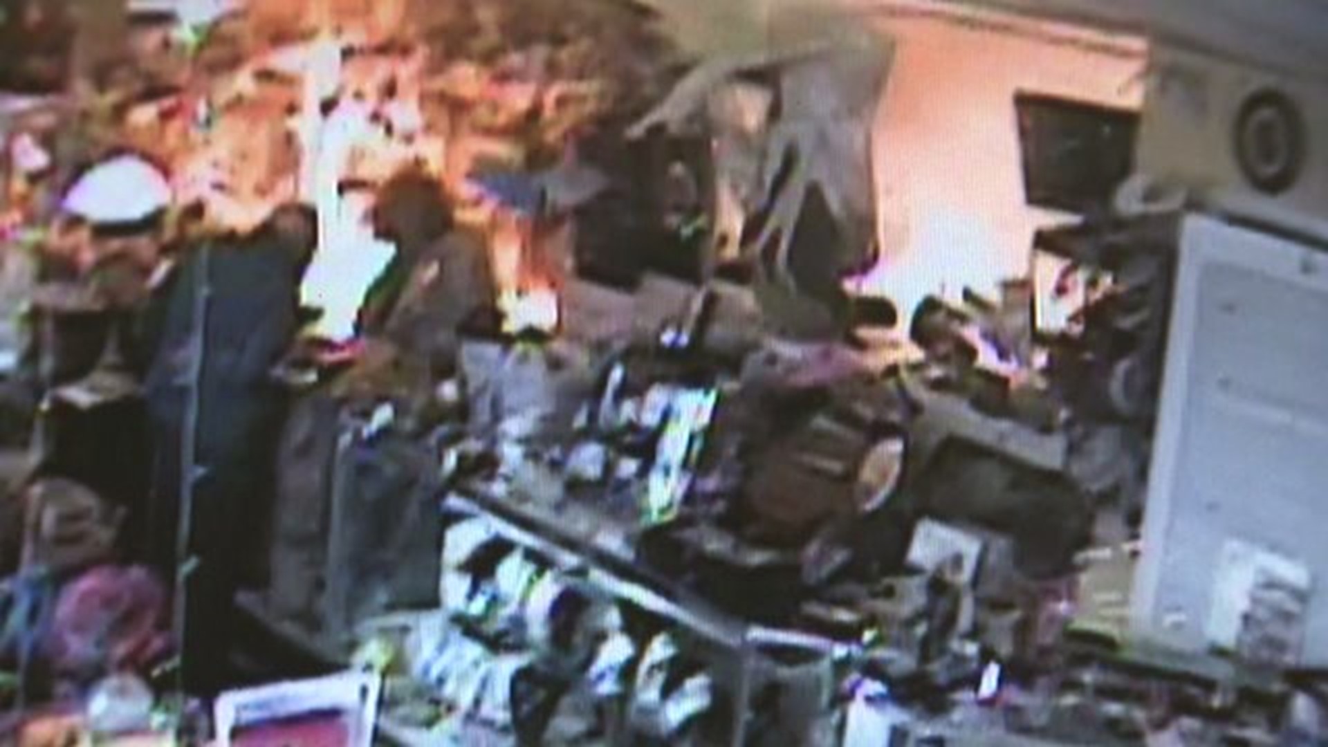 Surveillance video shows blast inside Rock Island antique store