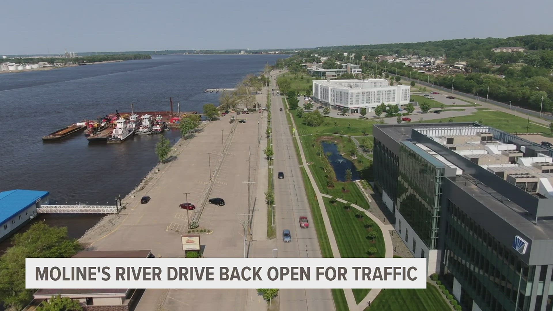 Crews finished cleaning up the road after the entire riverfront was closed for weeks due to flooding.