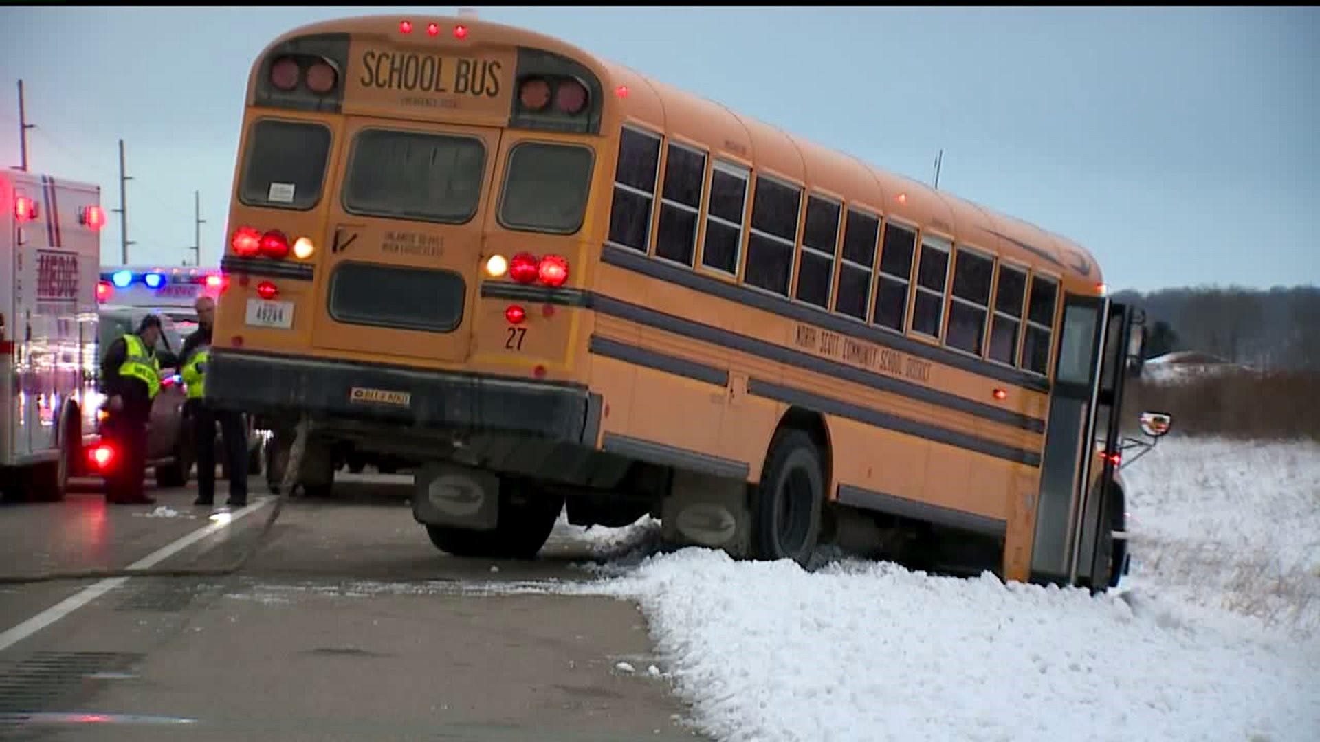 Bus slides into ditch near Princeton, Iowa