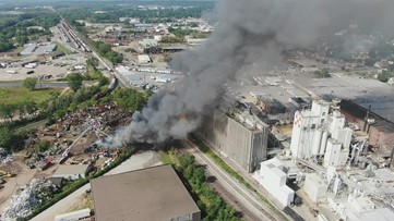 Crews battle large fire near River Drive in Davenport