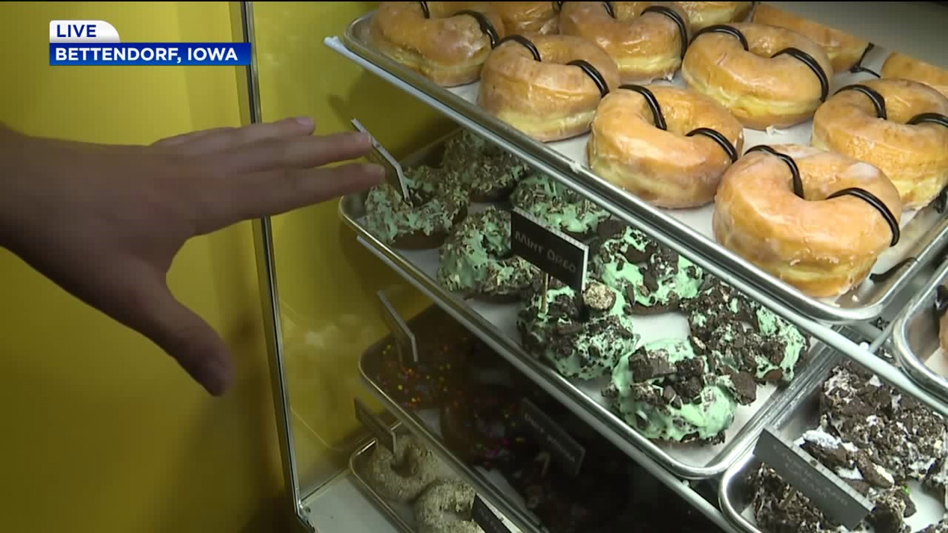 Davenport firefighters help make donuts for Clinton FD fundraiser