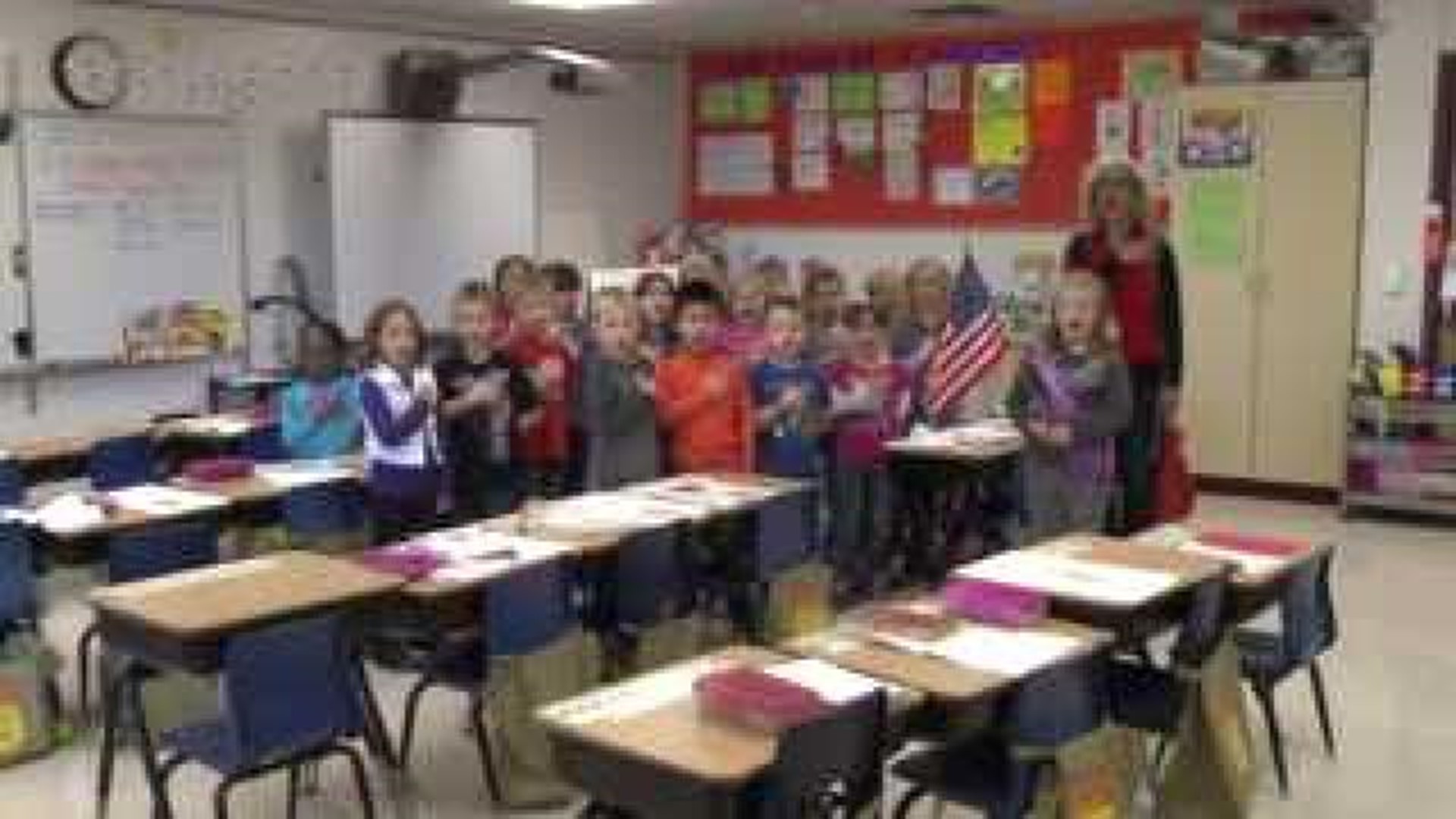 Mrs. Brown's class says the Pledge of Allegiance